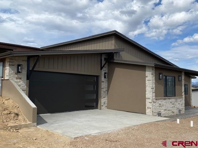 THIS BEAUTIFUL HOME IS READY TO MOVE IN.... Brand New Construction of Exquisite Contemporary Style and Design in a very desirable location just south of the Cortez city limits. This planned unit development is located in Montezuma County but less than a mile to great shopping, schools and restaurants with beautiful views of the mountains and vista's of the surrounding ranges. Blue Mesa Lot #6 is an 1,622 SF, 3 Bedroom 2 Bath Cruzan Creation of outstanding contemporary design and appeal with an artistic use of different textiles comprised of wood and stone accents, granite, ceramic tile, composite flooring and stucco exterior. Perfect maintenance free living for that family on the go or the couple that just wants to relax and enjoy the views while their at home. The Great Room effect has lots of natural light from the large windows that really shows off the exposed beams and beautiful cabinetry in the kitchen. The Master Suite has a beautifully tiled bathroom and a very spacious closet. This property is a fantastic opportunity own a very special home of Superior Appeal along with the ease and convenience of maintenance free living.