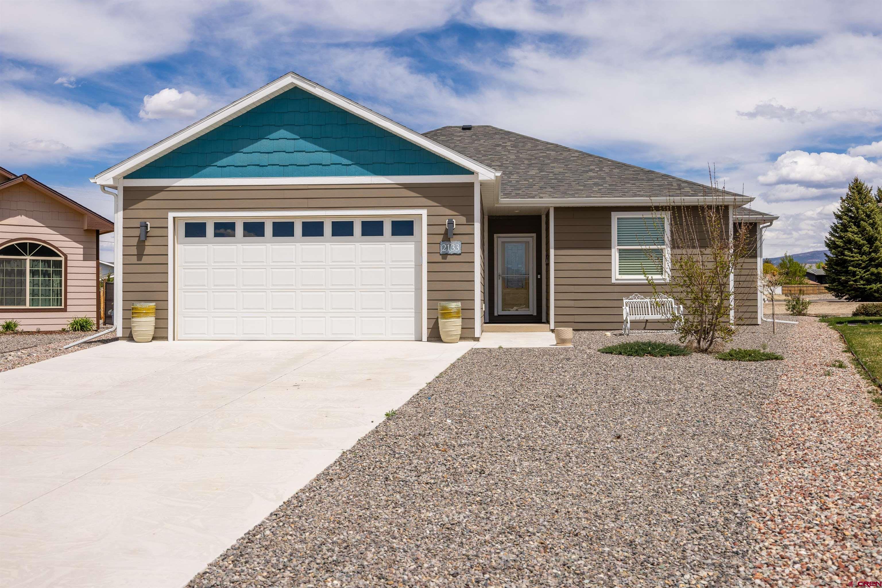 Step into comfort and style with this impeccably maintained 3-bedroom, 2-bath home nestled in the sought-after Sunrise Creek community of Montrose. Built in 2020 and thoughtfully upgraded, this home blends modern design with energy efficiency on a generous 0.27-acre lot. Inside, enjoy an airy open floor plan enhanced by fresh interior paint, upgraded doors, custom blinds, and eye-catching light fixtures. The heart of the home—the kitchen—shines with brand-new GE appliances, quartz countertops, a stainless steel farmhouse sink, and custom soft-close cabinetry, making it a dream for both everyday living and entertaining. Additional highlights include an energy-efficient hot water heater, a spacious two-car attached garage, and a bright primary suite with ample room to unwind. Two additional bedrooms offer flexible space for guests, an office, or creative pursuits. To top it all off, an active American Home Shield Warranty through year-end provides added peace of mind. Located in a welcoming neighborhood, this turnkey home is ready for you to move in and enjoy the best of Montrose living.