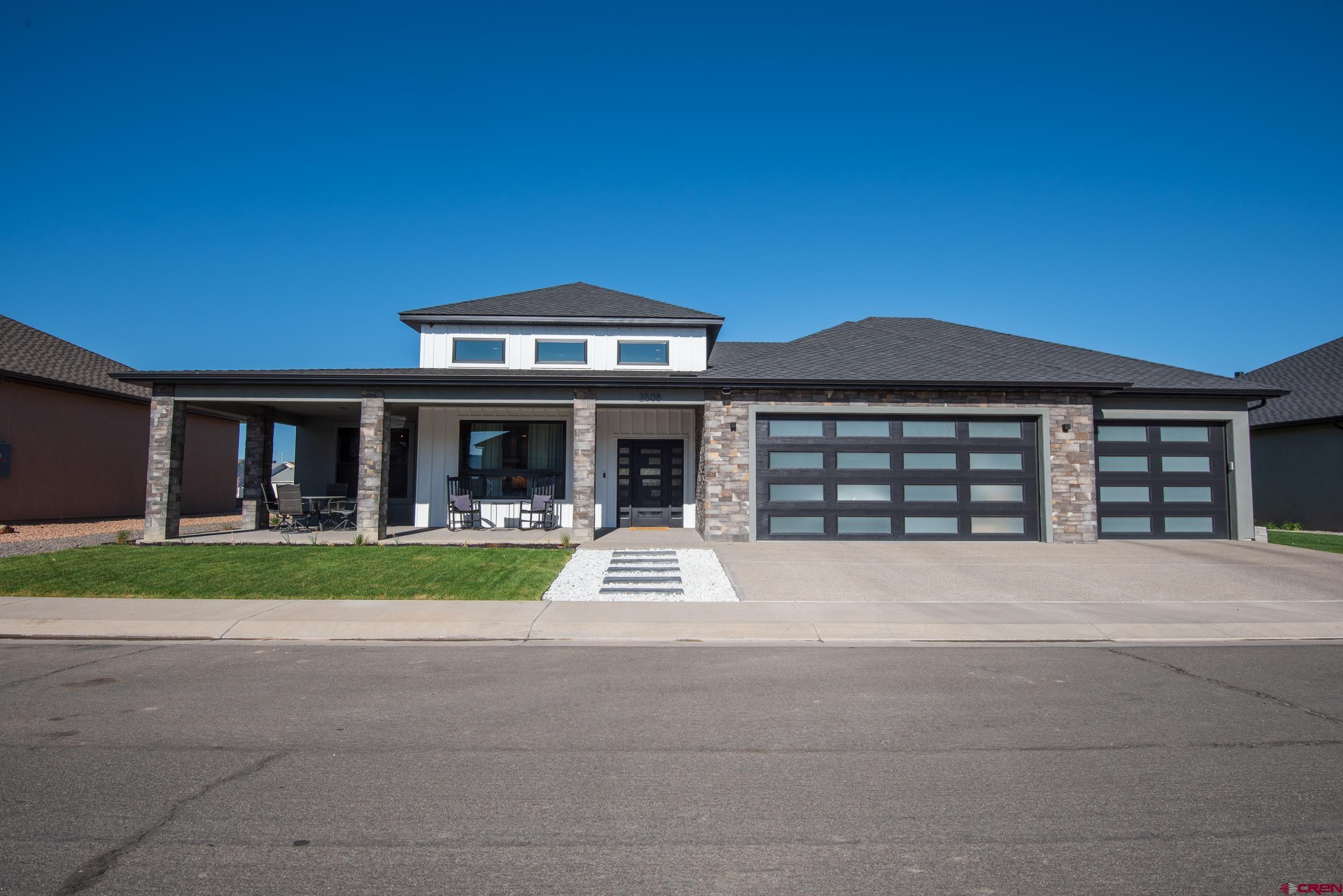 Welcome to your dream home in the prestigious Bridges Golf Community in Montrose, Colorado! This stunning custom-built home offers 2,290 square feet of luxurious living space, thoughtfully designed with comfort, style, and functionality in mind. Boasting three spacious bedrooms, two and a half baths, and an oversized three-car garage, this home is perfect for those who appreciate quality craftsmanship and modern design. The heart of the home features an open-concept layout, custom cabinetry, elegant granite countertops, large walk-in pantry, and a gas fireplace set into a beautifully designed accent wall—perfect for cozy evenings and entertaining guests. The expansive master suite is a true retreat, featuring a five-piece en-suite bathroom with a his-and-her sided closet, dual vanities and make up desk, a soaking tub, and a walk-in shower. The master closets includes direct access to the laundry room, which doubles as a spacious office area—an ideal setup for remote work or hobbies. Step outside to take in the beauty of the custom fence with built in seating and flower beds in the private backyard with covered patio or relax on the covered front porch, both offering peak-a-boo views of the San Juan Mountains. Don’t miss the opportunity to own this exceptional home in one of Montrose’s most desirable communities. Schedule your private showing today!