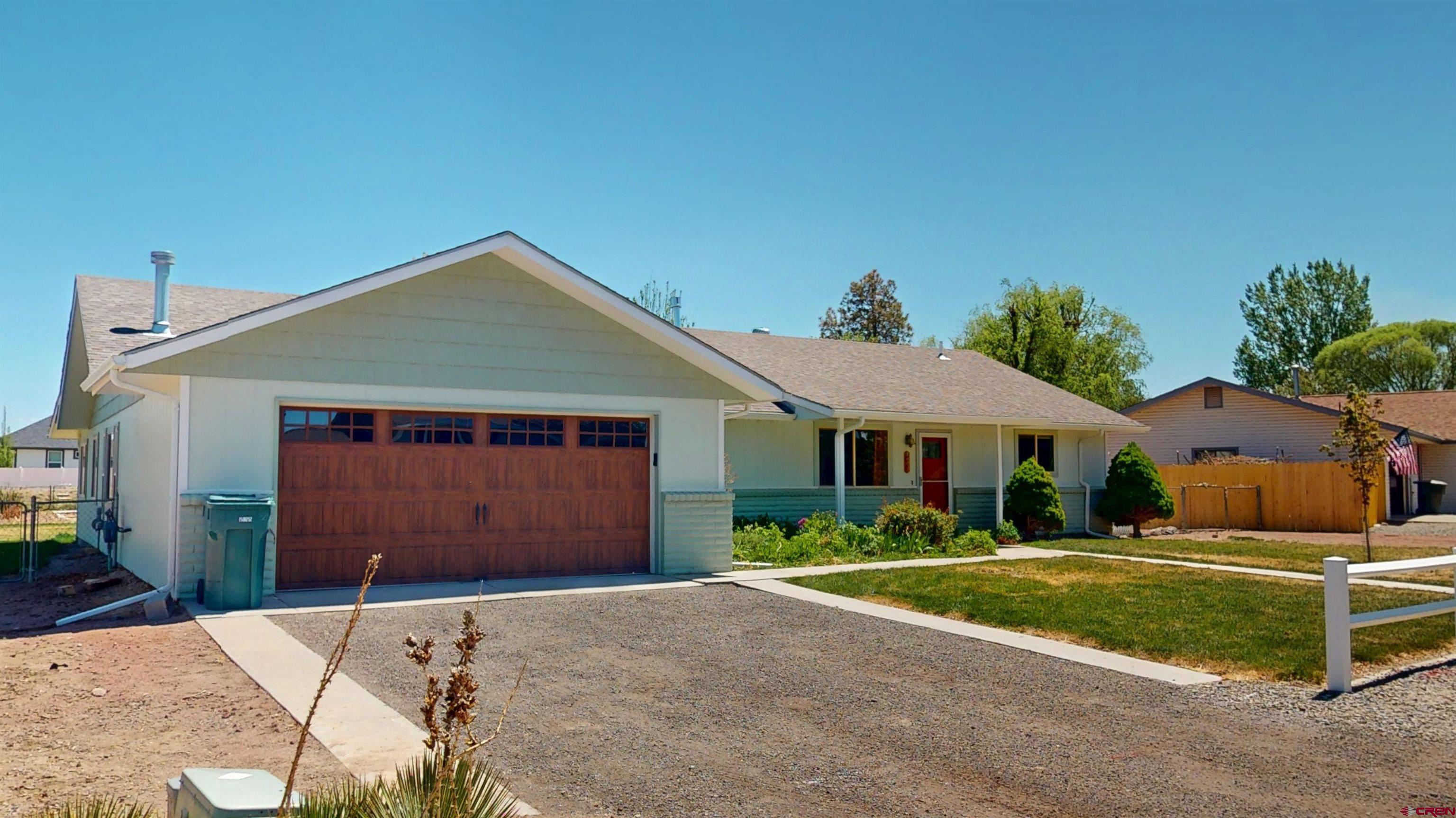 Nestled in the quiet and friendly Garnet Mesa Subdivision in Delta, this freshly painted 4-bedroom, 1 full bath + 3/4 bath home offers comfort, charm and space to grow. Inside, you'll find a warm and inviting layout featuring an eat-in kitchen—perfect for family meals, morning coffee or casual entertaining. The bright and airy living areas flow nicely, creating a welcoming atmosphere throughout. Home has had many updates and upgrades in the last few years including but not limited to new hot water heater, painting, gutters, landscaping including a gazebo for relaxing, new gas stove, new irrigation pump and much more!  Step outside to a generously sized, fully fenced yard that’s ideal for kids, pets and gatherings. Enjoy peaceful evenings or weekend barbecues under the charming gazebo while taking in the beautiful mountain views. A spacious shed offers extra storage for tools, toys or hobbies. This home blends functionality and outdoor enjoyment in a serene setting—don't miss the opportunity to make it yours!