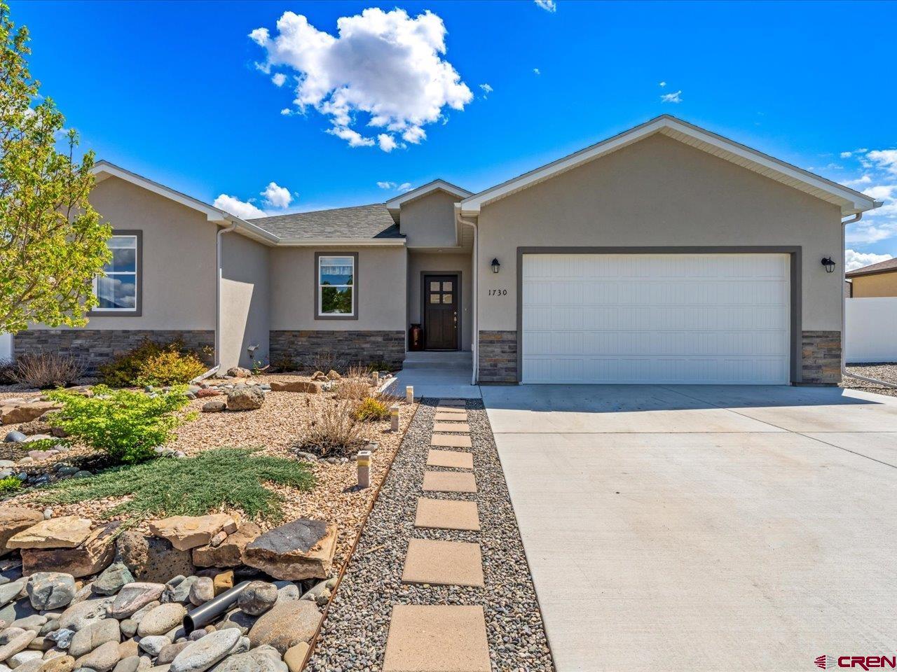 Welcome home to Stargate subdivision. Conveniently located minutes from downtown Montrose in a quiet neighborhood on a cul-de-sac street with low traffic is a like new and beautifully maintained home.  Custom built in 2020 by Boggan Construction, many upgraded features went into this home.  The large, beautiful kitchen features granite countertops accented with subway tile backsplash, gorgeous lighting, soft close doors and drawers and includes all stainless steel appliances. With bar seating at the island, guests can still converse with the cook and not be in the way. The adjacent dining room has windows to the east and south bathing the home in natural light. The great room features low maintenance LVP flooring that runs throughout most of the home and a sliding glass door to the large back patio. This floor plan offers separation between the primary bedroom and the secondary bedrooms. The primary bedroom suite has carpet to comfort your feet and a spacious walk-in closet, while the primary bath is complemented with tile flooring, a dual sink vanity with marble countertop, a tiled walk-in shower, separate tub with tile accents and a private water closet.  Ready for some fresh air?  Step outside and enjoy the sunshine on the back patio and watch the littles play in the 6x6 covered sandbox, climbing wall, playhouse and swing. This home sits on a corner lot with a small park area across the street allowing for a more open feel.  It has a spacious, grassy side yard to the east where you can get afternoon shade on hot summer days and the west side is finished with gravel and irrigation lines ran for raised garden beds. The tasteful landscaping is adorned with stone accents and pottery decor that's included with the home and features a Chanticleer pear tree, purple flowering crabapple tree and grape vines along the fence that produce delicious seedless table grapes. Outside maintenance is made easy with a six zone smart sprinkling system, controllable via a smartphone app. Need extra space for storage or just a place to get away?  Retreat to the detached  10x12 insulated storage shed with electricity and fully finished interior.  The attached garage is also equipped with an electrical system set up for woodworking, a finished floor and a side door leading to the backyard. There's room to park toys behind the RV gate on the graveled side yard. Life is forcing a move from a home that the owner describes as a place they feel safe with friendly and kind neighbors. We're hoping you and your family will have the same comfort level and peace this home has brought to them.