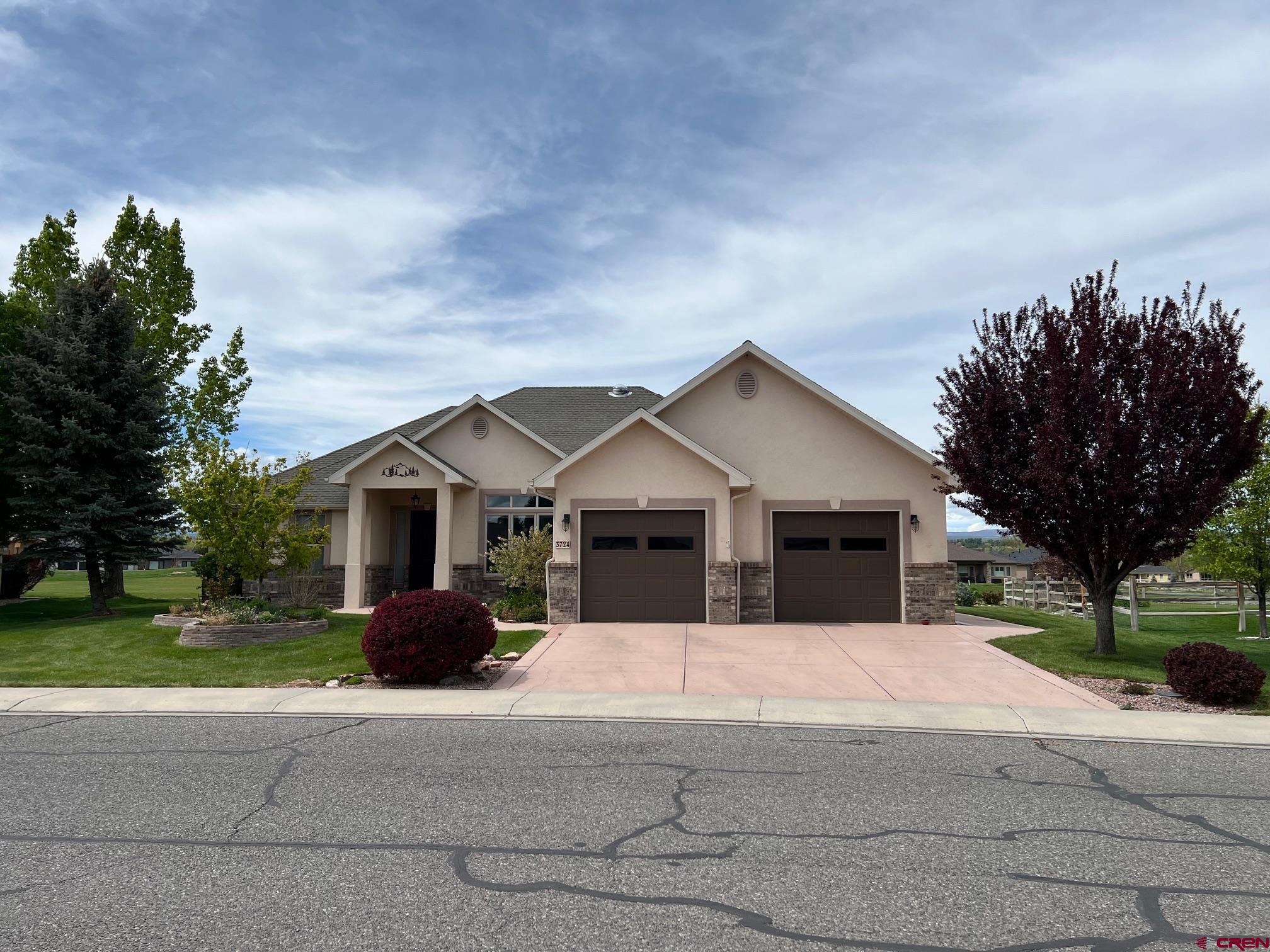 Light, Airy and Open floor plan, this 3 bedroom, 2 bath home in Cobble Creek  has unobstructed permanent views of the San Juans, Cimarrons and Horsefly. Plus it is a great distance from the tee and cart path with HOA maintained green space and a creek between the golf course and the home. High ceilings and a large south facing window wall and atrium door open to the beautiful view and large patio enclosed with a stucco and brick half wall. Large kitchen and pantry with a spacious dining area and large eating bar illuminated by a Solar Tube adding natural light to the kitchen and bar. The Master bedroom has a spacious sleeping area and a roomy large walk-in closet. One of the extra bedrooms is large and has shelves instead of a closet but there is plenty of space to add a closet if needed. The garage is a two and a half and has a golf cart over head door on the side of the house. So park your golf cart or put a shop in the over sized 2 car garage. The Master bedroom has an access door to the patio if an owner wanted to add a hot tub. Seller Concession of $5000.00 to the Buyer for a full price offer! This home has great curb appeal with beautiful landscaping and plantings!!! Creek front. Patio has a power operated retractable awning/ sunshade.