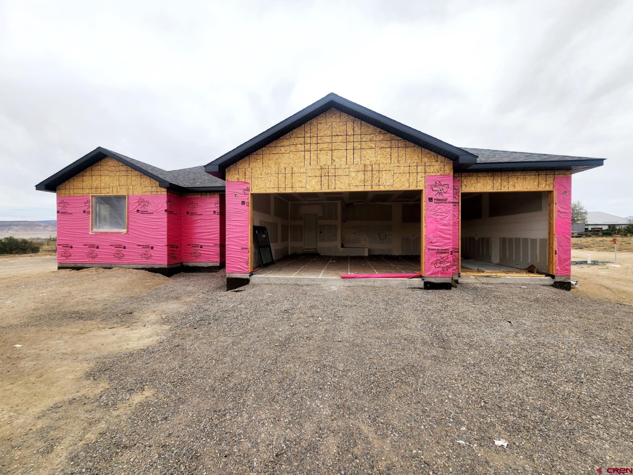 NEW CONSTRUCTION, MOUNTAIN VIEWS, 1ACRE LOT, NO HOA....Come and see this new home being built by Faucett Builders.  The home is 1958 Sq. Ft, Very open plan with large living room, dining and kitchen.  Great for entertaining or for family visiting.  The living room has a gas Fireplace 1/2 stone and the top finished with a shiplap board finished with a mantel.  2 tv spots, so you have choices!  outside.  Large windows throughout the home so that you can enjoy the views from inside as well.    Dining room has access to the covered patio in the back great for outdoor relaxing or enjoying family bbq's.  The cabinets are maple craftsman doors stained almond.  They alternate idifferent heights ending in a full size pantry cabinet.  The island is about 103 inches long includes built-in microwave, dishwasher, farm sink, double trash can and a 3 foot wide top.  The color of the island is sage.   Pet friendly vinyl Plank flooring throughout much of the home with carpet in the bedrooms and tile in bathrooms. It is a split floor plan with the Primary bedroom on one side of home with walk-in closet, free standing tub and shower, vanity with two sinks and two  lighted mirrors . Plenty of room in the other bedrooms measuring approximately 12 x 11 each with nice closets and  the second bath.  There is also an office space just off of the kitchen area.  The insulated and finished large 3 car garage has enough space for a workshop area.  From the garage you have direct access  into the Laundry/utility room ,with cabinets/sink.  Some other features of the home incllude a Large 1 acre lot that you can build a outbuildings for all your toys, room for your RV.  There are covenants, but no HOA.  The house will be completed in approximately 60-90 days.  Ready to walk through and make it your home!