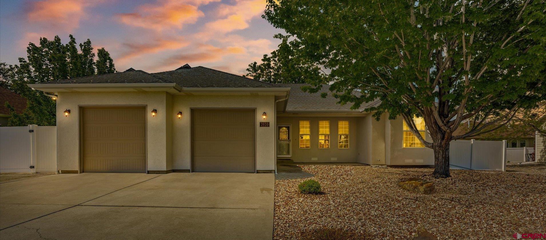 Exuding timeless elegance and modern sophistication, this meticulously designed home is what you get when a senior engineer has a house built -- timeless quality and efficiency, ease of living and no detail overlooked: efficient and comfortable mini split air conditioning in main areas and Primary bathroom, Plus in-floor heat in the main areas and hot water baseboard in bedrooms. Separate electrical circuit in the office/ third bedroom, central vacuum, solar panels, convenient and logical switches, and lighting, on-demand hot water for the extra deep jetted tub in the Primary bath, extra deep double sink for those large pots and pans, and beautiful stainless steel appliances in the kitchen. Bonus! There are pull outs on most of the lower cabinets for easy access for all your gadgets.  Wired surround sound throughout the home offers an unparalleled blend of luxury, comfort, and functionality in a serene neighborhood. From the moment you step inside, you’re greeted by expansive living areas adorned with high-quality tile flooring that flows seamlessly through the open-concept spaces, creating a cohesive and inviting atmosphere.  The living room is a true is a true architectural gem, featuring a striking three-tier ceiling accented by intricate crown molding, infusing the space with grandeur and warmth. Retreat to the private quarters, where 3/4” hardwood floors grace the bedrooms and closets, offering a rich, inviting ambiance. The primary suite is a sanctuary of indulgence with 3/4" hardwood floors and boasting a fully renovated 5-piece bathroom with a very large jetted tub, double sinks and step in walk-in shower. Perfect for unwinding in spa-like serenity, complemented by premium fixtures and finishes that elevate the everyday.