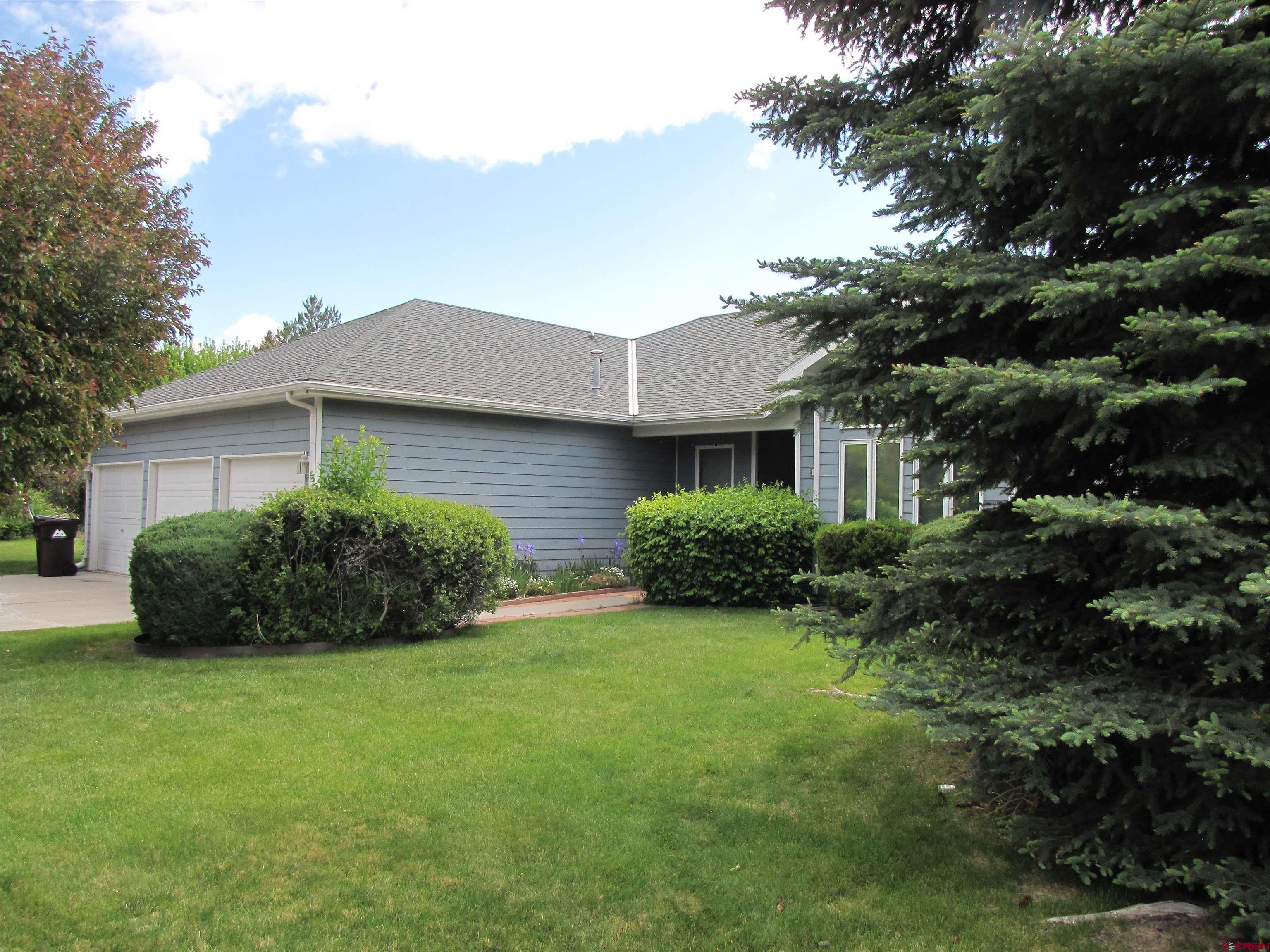 Spacious 4-Bedroom Home with 3-Car Garage on Over Half an Acre Welcome to this well-maintained 2240 sq ft home in a quiet, desirable neighborhood. This property offers 4 bedrooms and 2 bathrooms, providing plenty of space for comfortable living and future updates. Enjoy the convenience of an attached 3-car garage, plus two additional storage sheds—perfect for tools, hobbies, or extra storage needs. The 0.53-acre lot gives you room to spread out, garden, or entertain. The previous owner lovingly cared for vibrant rose gardens, which are ready for a green thumb to restore their former beauty. With a solid layout, generous lot size, and fantastic location, this home is full of potential. Whether you're looking to settle in or invest, this property is a must-see!