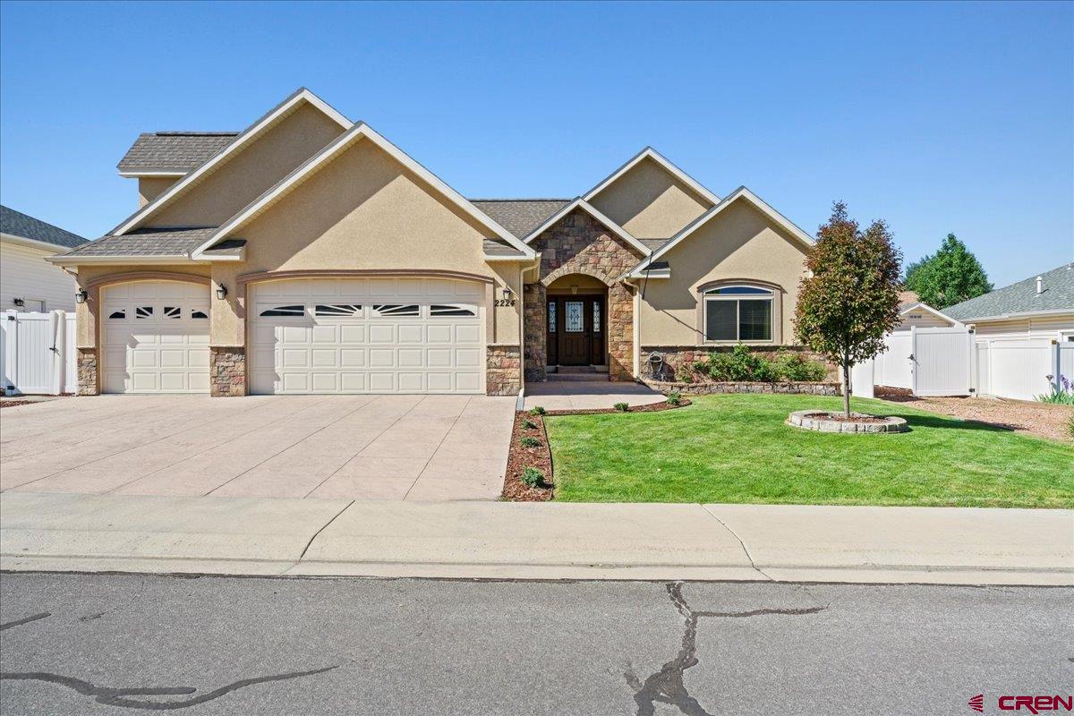 Just the right home in just the right neighborhood!  From the entrance into the home you'll fall in love with this stylish yet comfortable and bright home.  The kitchen boast hardwood cabinets and granite tile countertops and a Kucht Professional 4 burner gas range.   Master bedroom with big windows into the backyard with a spacious master bathroom with a jetted tub and separate walk in shower.  On the opposite side of the home you'll find 2 nice bedrooms and a sizable bathroom   The upstairs bonus room can be used for any purpose that fits your fancy.  It could be a 4th bedroom, work out room, mancave or classroom for home schoolers.  Hardwood and tiled flooring make the home easy to keep clean.  The oversized THREE car heated garage allows for year round comfort for parking an additional work space.  The back yard retreat has a new beautiful pergola, covered patio, greenhouse, above ground gardens and a nice storage shed that comes equipped with electricity.   PARK YOUR RV HERE!   Yes , plenty of room to park your RV behind the fence.   Special features include:  Eco friendly solar system, radon mitigation system, all NEW window with a transferable lifetime warranty .