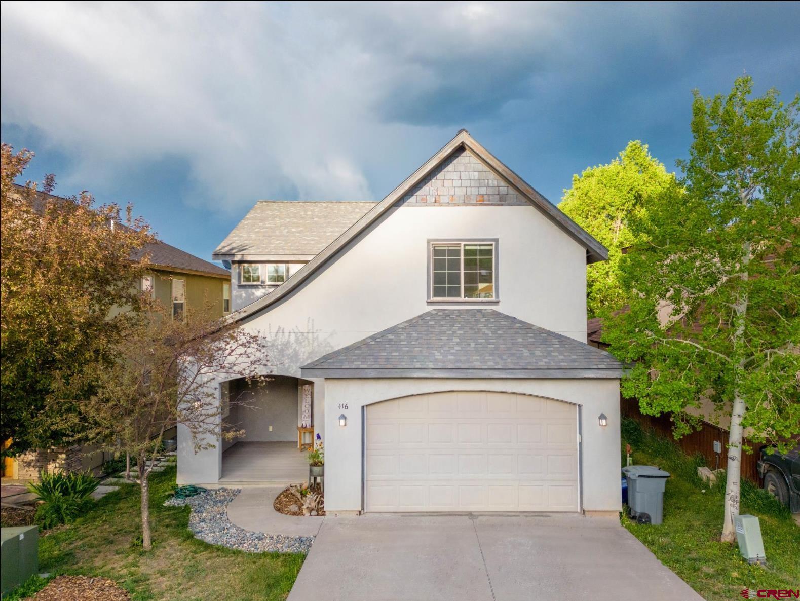 Welcome to 416 Amy Way—a beautifully maintained 3-bedroom, 2-bathroom home nestled in the desirable Le Ranch subdivision of Ridgway, CO. Built in 2004 and offering 2,095 square feet of living space, this stick-built residence blends modern convenience with serene mountain living.  Set on a quiet street with mountain and valley views, this home features a spacious attached 2-car garage, cozy living room dining area, and forced air heating. The primary bedroom is located on the main level for added ease, and you'll love the light-filled interiors, tile and partial carpet flooring, and practical features like a W/D hookup, ceiling fans, garage door opener, and window coverings.  Located in the heart of Ridgway with easy access to schools, parks, and outdoor recreation, this home offers both comfort and lifestyle. The lot is thoughtfully designed with public utilities, natural gas, and city water/sewer connections. Zoned for residential single-family, it's the perfect primary home or investment opportunity.  Don't miss your chance to live in one of Ridgway’s most charming neighborhoods.