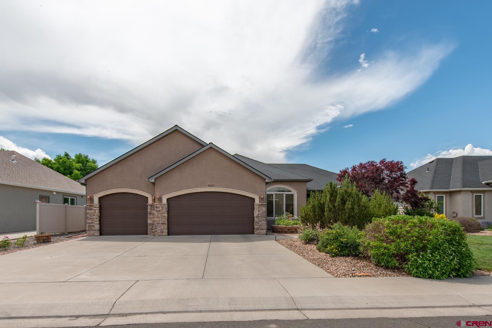 Welcome to this stunning and meticulously designed home, located in a desirable neighborhood, just minutes from golf course, shopping, recreation center, and more. This home features 3-bedrooms, 2-bathrooms, and an additional office/den space. From the moment you enter, you’ll be captivated by the elegant finishes, thoughtful design, and high-end details throughout—including soaring 8-foot doors that add a touch of sophistication to every room. The spacious open-concept layout is ideal for both everyday living and entertaining, featuring a stylish kitchen with quality finishes, ample cabinetry, and seamless flow into the living and dining areas. The dedicated office provides the perfect space for working from home, studying, or creative pursuits. Retreat to the generously sized primary suite, complete with a luxurious en-suite bathroom and large closet room. Two additional bedrooms offer comfort and flexibility for family or guests. Outside, enjoy your own beautifully landscaped oasis with a lush yard maintained by a full sprinkler and drip system. The inviting patio is perfect for morning coffee, evening relaxation, or weekend gatherings. A spacious 3-car garage provides ample room for vehicles, storage, or hobbies. With its combination of elegance, comfort, and location, this home is truly a rare find. Don’t miss the opportunity to make it yours!