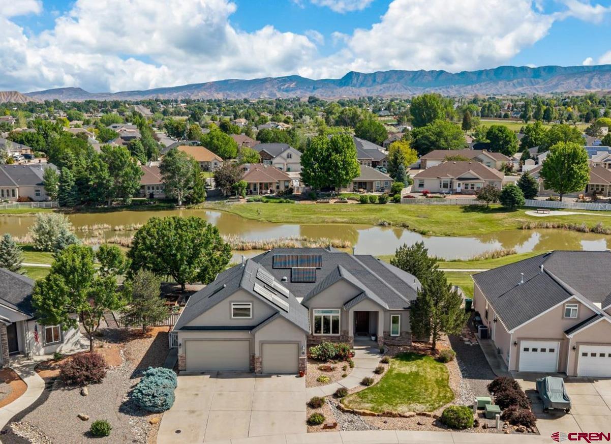 Pristine Preserve Masterpiece with Serene Arroyo Views, Elevated Finishes, Massive Garage, and Bordering Open Space! This home delivers a mesmerizing journey of beauty and elegance, from the gorgeous finishes to stunning views in the backyard. Step inside to high-quality hardwood floors, double recessed ceilings, and a modern fireplace. The kitchen features on-trend and contemporary solid wood cabinetry, tasteful granite and tile, plenty of counter space with a large, eat-in bar, and a perfectly ergonomic layout. Enjoy the desirable split floor plan, which also provides views and great natural light from all angles and rooms. The en-suite is a dream, with an oversized soak tub, beautiful tile, a walk-in shower, and a large walk-in closet. The bedroom itself has unbelievable views and would be the ideal spot for your yoga mat or reading nook. The home also provides an office with high ceilings and double doors, a great space for a library or an entertainment room. The oversized, 3-car garage is an amazing place to not only store large vehicles, but also has an extra extended bay, which could be utilized as a workshop or for more storage. The home also has additional storage with a built out flex room on the side of the home.  The functionality and the quality of this home continue with recently updated Anderson windows, an efficient furnace with a built-in humidifier, a spacious bonus room above the garage with exceptional natural light and flexibility, and a high level of detailed construction throughout that makes this home a no-brainer. As if this were not enough, one step to the back patio will melt away anxieties and stress, with one of the most picturesque views and environments you will come across. Bordering open space, walking paths, and a lush arroyo preserve teeming with wildlife, your favorite beverage will hit differently morning and night. Minutes' drive from a world-class recreation center and pickleball heaven, curated cuisine and shopping and unmatched healthcare, is this even a decision? The Discerning Buyer Won't Wait; Make This Your Reality Today!