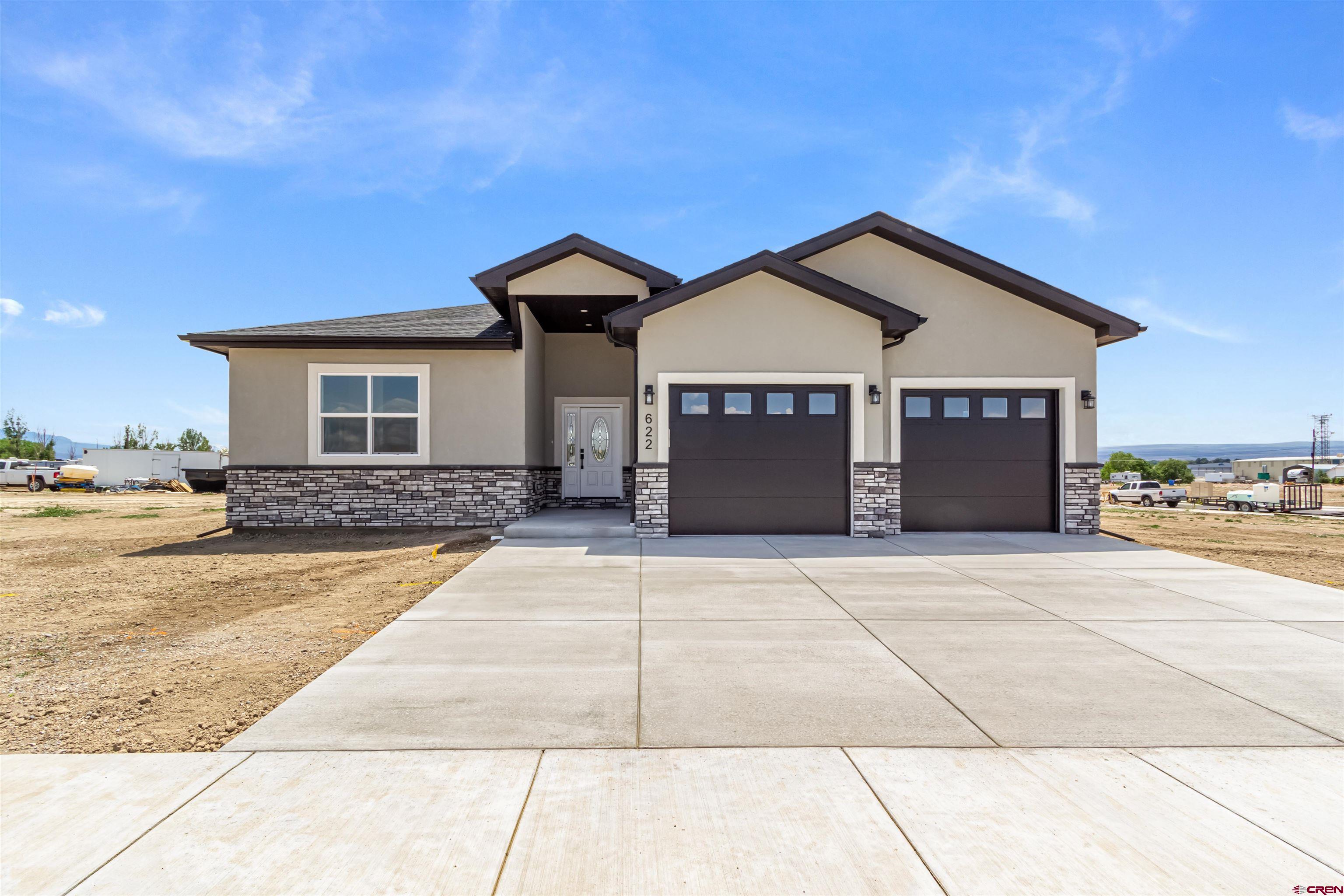 Experience refined living in this stunning new construction home, thoughtfully designed with a modern aesthetic and high-end finishes. Located in an exclusive new subdivision, this 3-bedroom, 2-bath residence showcases a seamless open floor plan, perfect for sophisticated entertaining or relaxed everyday living. Step into the chef’s kitchen featuring premium quartz countertops, custom cabinetry, and sleek design details that flow into the spacious living area. The primary suite offers a serene escape with a spa-inspired tile walk-in shower and self-standing tub.  Additional upscale features include:  Quartz surfaces throughout  Spacious walk-in closet in the primary suite  Tesla charging station inside the attached garage  Modern light Fixtures  Contemporary exterior finishes for timeless curb appeal  Enjoy the privacy and peace of a newly developed community, while still being minutes from key amenities. This home is a perfect blend of modern sophistication and everyday functionality.