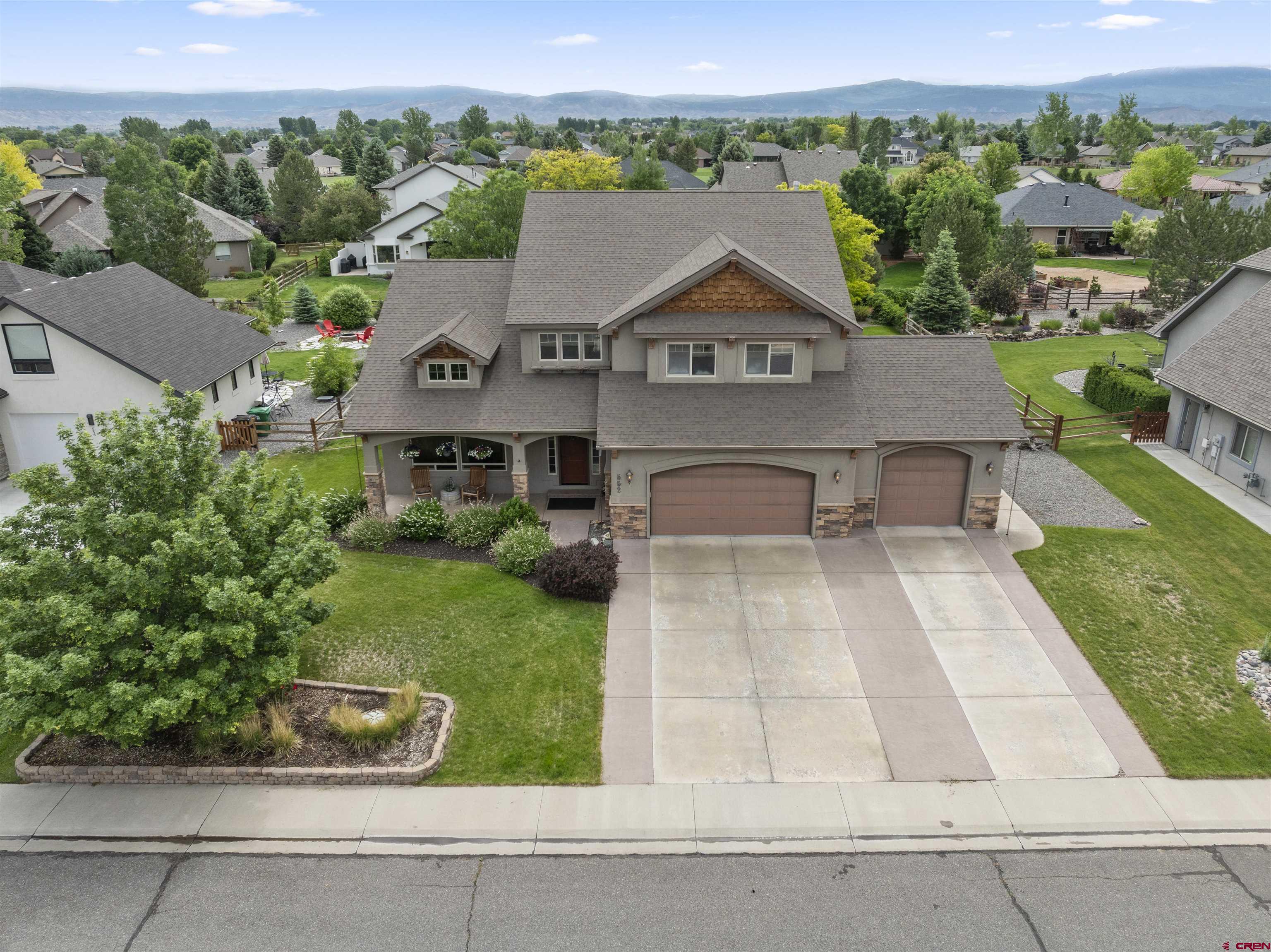Beautiful two story home with Primary Bedroom on the main level.  This home offers a lot of space and style.  The Custom Kitchen offers a breakfast bar, dining area, large pantry and Stainless appliances while opening to the large living room with vaulted ceilings and gas fireplace.  From the dining room, you can walk out to a large fence back landscaped yard.  The large patio provides for outdoor cooking or relaxing with your morning coffee.  The Primary bedroom has a wall of windows looking out to the backyard and patio, The room is large enough for all of your furniture and the bathroom has both the  tub and separate shower, double sinks and large walk-in closet.  Upon entering the home, you will find a nice sitting room/den or could be a nice office space. There is a 1/2 bath, laundry room with many cabinets and utility sink next to the entrance from the 3 car attached garage.  The garage has numeroous built in cabinets .  The stairs take you up to the 2nd level and opened to the downstairs living room and kitchen area.  There are three nice sized bedrooms, 1 bath with tub/shower and ample storage.  The 4th Bedroom has a room attached large enough for a nice sitting area, yoga and meditation room.  Very Comfortable. If you are a golfer or just like to live in a beautifully maintained Golf Community, then you need to know about Cobble Creek,  The amenities include a like new Clubhouse which includes  Pro Shop, Bar and smaller Restaurant.  Great place to meet your friends.  Upstairs includes a wonderful place for Venues, both for the club members or available for your private parties, and catering is available.  There is a Private fitness gym available  and Pickleball courts plus the driving range and putting green. RV Parking is also available.   Cobble Creek is not just a golf community, it's a LIfestyle!!