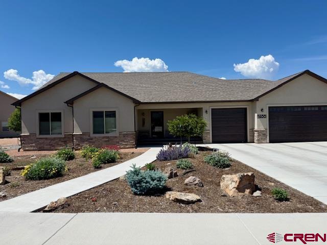 Welcome to this beautifully maintained single-family home in the desirable English Gardens 4 subdivision—a quiet residential enclave just minutes from downtown Montrose. Built in 2021, this 1,922 sq ft residence sits on a spacious 0.35-acre lot and offers 3 bedrooms, 2 full bathrooms, and an open-concept layout designed for modern living.  Enjoy energy efficiency and long-term savings with a powerful 15-megawatt solar empowered system. Inside, the home boasts luxury laminate flooring, tile in wet areas, and an open floor plan filled with natural light. The kitchen is a chef’s dream featuring stainless steel appliances, a large pantry, and a central island with a bar and sink—perfect for entertaining.  The primary suite offers an oversized bathroom with dual vanities, a walk-in shower, and not one, but two walk-in closets. Both bathrooms are thoughtfully designed with tile flooring and ample space. Additional highlights include a cozy fireplace, laundry room, and an oversized 3-car garage with extra storage and a workshop area.  Step outside to enjoy low-maintenance living with native, low-water landscaping, a sprinkler system, Trex decking on the covered front porch, and even space for gardening, composting, or RV/toy parking. Enjoy breathtaking views of the San Juan Mountains from your own backyard oasis.  Conveniently located near city transit, schools, parks, trails, shopping, and restaurants, this move-in-ready home is a rare find in one of Montrose’s most peaceful neighborhoods.  Don’t miss your chance to own this well-appointed home in a prime location!