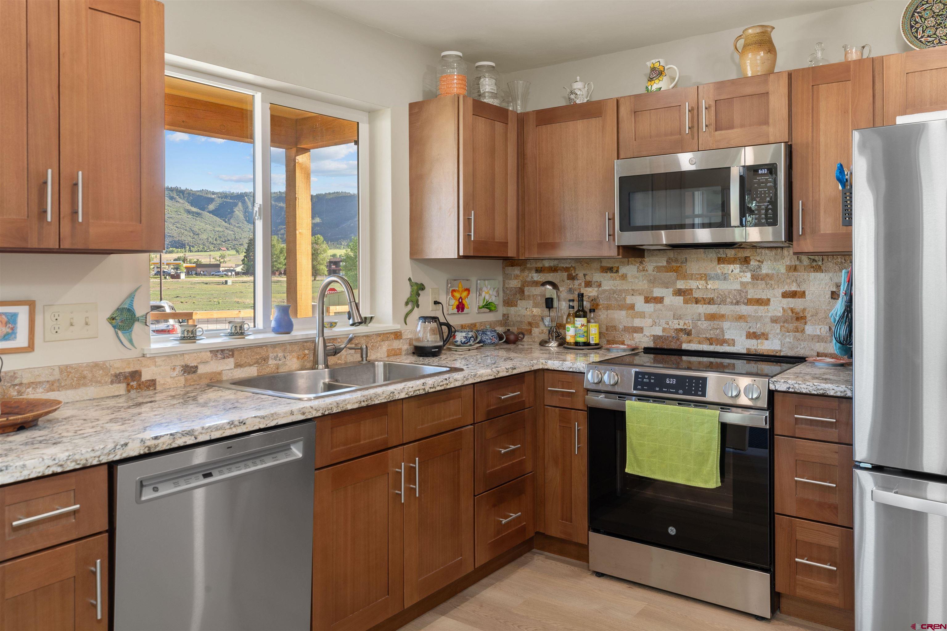 Ten houses are already sold. Three new construction homes will be finished on approximately July 14. Ready to view. Ask broker about the ten additional lot/build properties in Phase 2. This community is designed as an easy walking get to know your neighbor cluster of homes. Every porch has a view of the mountains. Views of ranch land behind the homes. There are walking paths in front of all of the houses. Dog friendly! There is a club house for meetings,birthday parties etc adjacent to the patio/hot tub area. All homes have 1 fireplace (bio fuel) Broker is on site several days a week but please call for a showing.