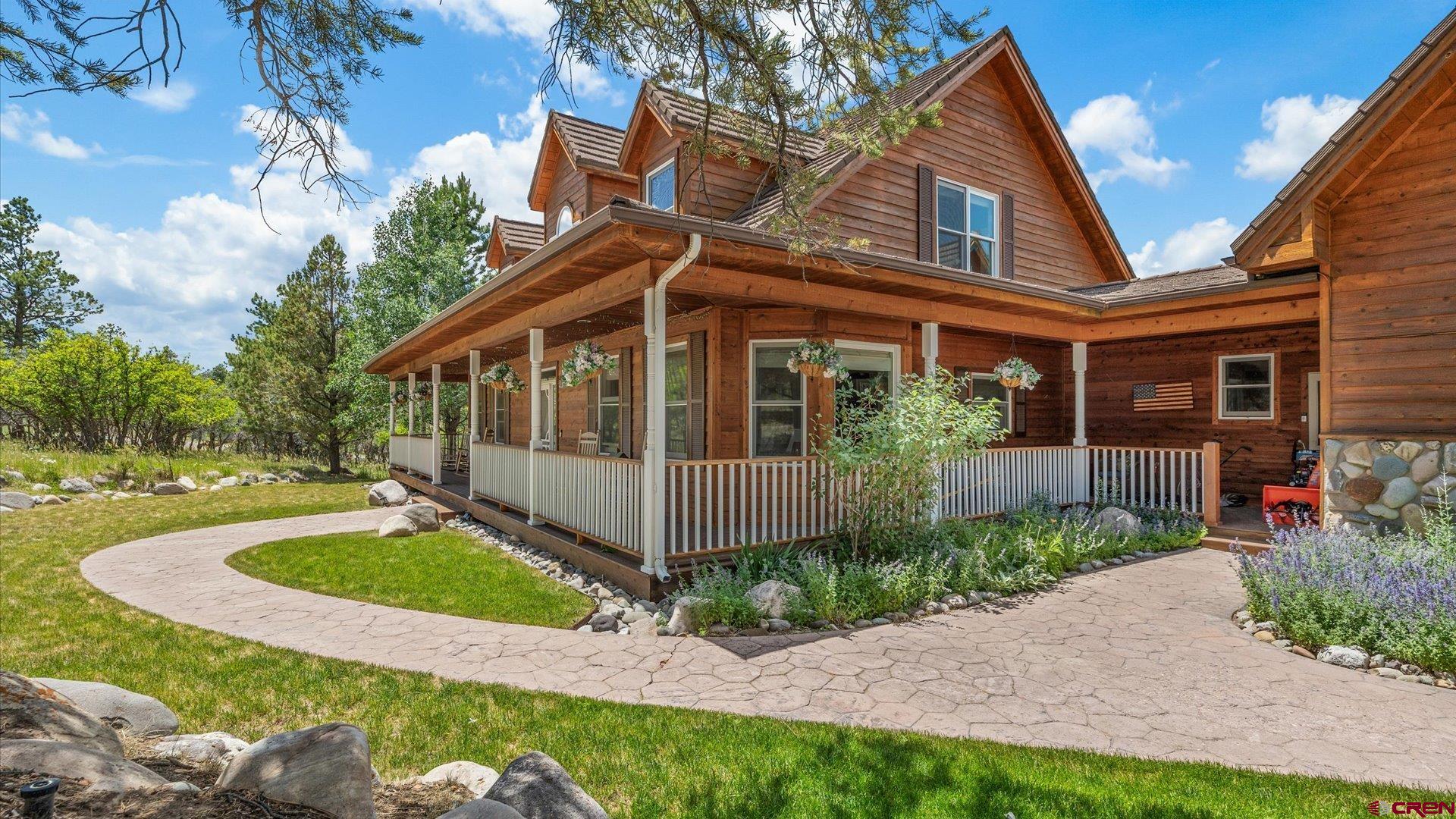 Situated at the end of a serene cul-de-sac within the esteemed Divide Ranch Golf Course, this exceptional 4-bedroom, 3.5-bathroom residence artfully combines privacy, comfort, and sophistication. Adjacent to the Greenbelt, with a great view of the 8th hole, this property not only offers seclusion but also benefits from minimal traffic.  Upon entering, you are greeted by expansive, light-filled living areas that are perfect for entertaining guests or enjoying daily relaxation. The gourmet kitchen, designed for social gatherings, flows seamlessly into a meticulously crafted outdoor living space, ideal for savoring morning coffee or hosting evening events beneath the stars. The main-level primary suite features a garden tub for a soothing soak, complemented by a steam shower for unwinding after a long day. A unique attribute of this home is the separate bonus room, which includes its own private bathroom, presenting a multitude of possibilities. This versatile space could serve as a craft or hobby studio, a dedicated home office, or be easily transformed into a multi-generational living suite. Whether you are an avid golfer, a nature enthusiast, or simply in search of a peaceful retreat, this property epitomizes the lifestyle you have always envisioned.