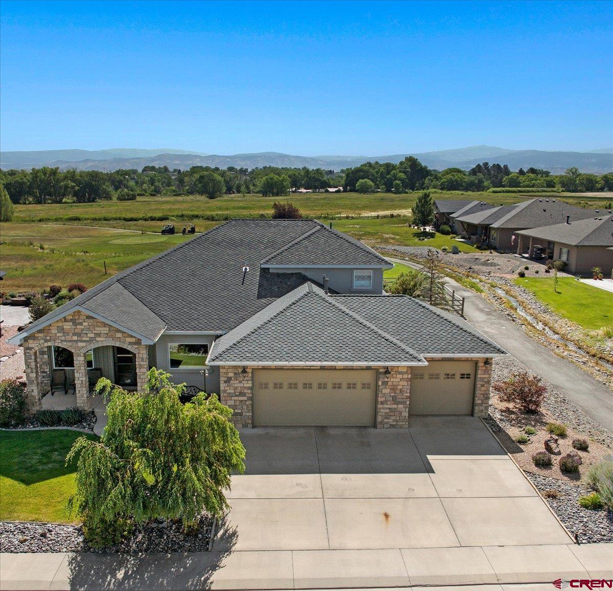 Whether you're an avid golfer or simply love serene, upscale living, this property is your personal retreat in one of Colorado's most sought after communities. Located on the seventh hole in the prestigious Cobble Creek Golf Community, this beautiful custom home is surrounded with the most stunning views from the golf course, to the mountains and sunsets. This 3 BR plus office, 2.5 bath, 3 car garage home provides the luxury of indoor/outdoor living with a formal dining room as well as an enclosed sunroom that opens onto an east facing covered patio. The spacious open floor plan with large living room featuring 17' ceiling, kitchen with wet bar, wine cooler and huge pantry is great for entertaining . High end finishes are featured throughout from knotty alder cabinetry, granite countertops, travertine floors, to textured custom paint. Two large guest bedrooms with  guest bath conveniently located between the to is upstairs providing fantastic views of the San Juan Mountains. The large downstairs master suite features a spa-like master bath. Other features include a nice size laundry room and powder room. This lovely home has so much to offer.