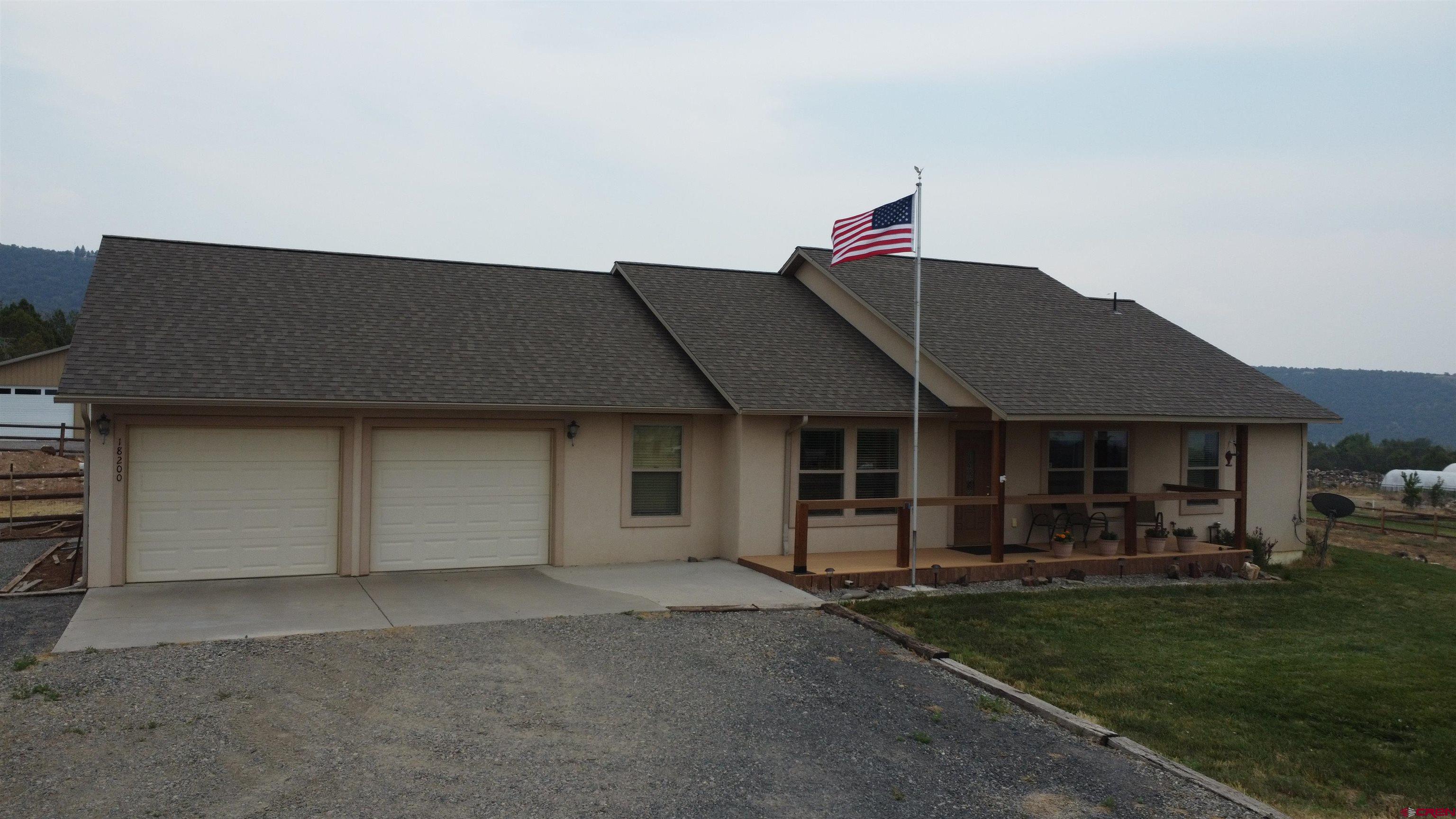 Dreaming of your perfect home? Check this one out!  This stunning 3-bedroom, 2 full bath ranch-style gem in beautiful Cedaredge, CO is calling your name! With a newly remodeled kitchen with granite counter tops and gorgeous hardwood floors throughout the home. You'll love cooking and entertaining here. Enjoy your morning coffee on the cozy covered front porch or relax in the fenced backyard with a patio. This stucco home is a beauty. And there's a spacious 2-car attached garage and a massive 30x36 heated metal shop building for all your hobbies! Cedaredge not only is home to the Grand Mesa Art Center and many restaurants to dine in. But, is just minutes away from the Amazing Grand Mesa, which has something for everyone to do in the great outdoors. From ATV and side by side riding, camping, fishing, down hill or cross county skiing, hiking, biking or fishing in one of the over 300 lakes. It's perfect for outdoor adventures!