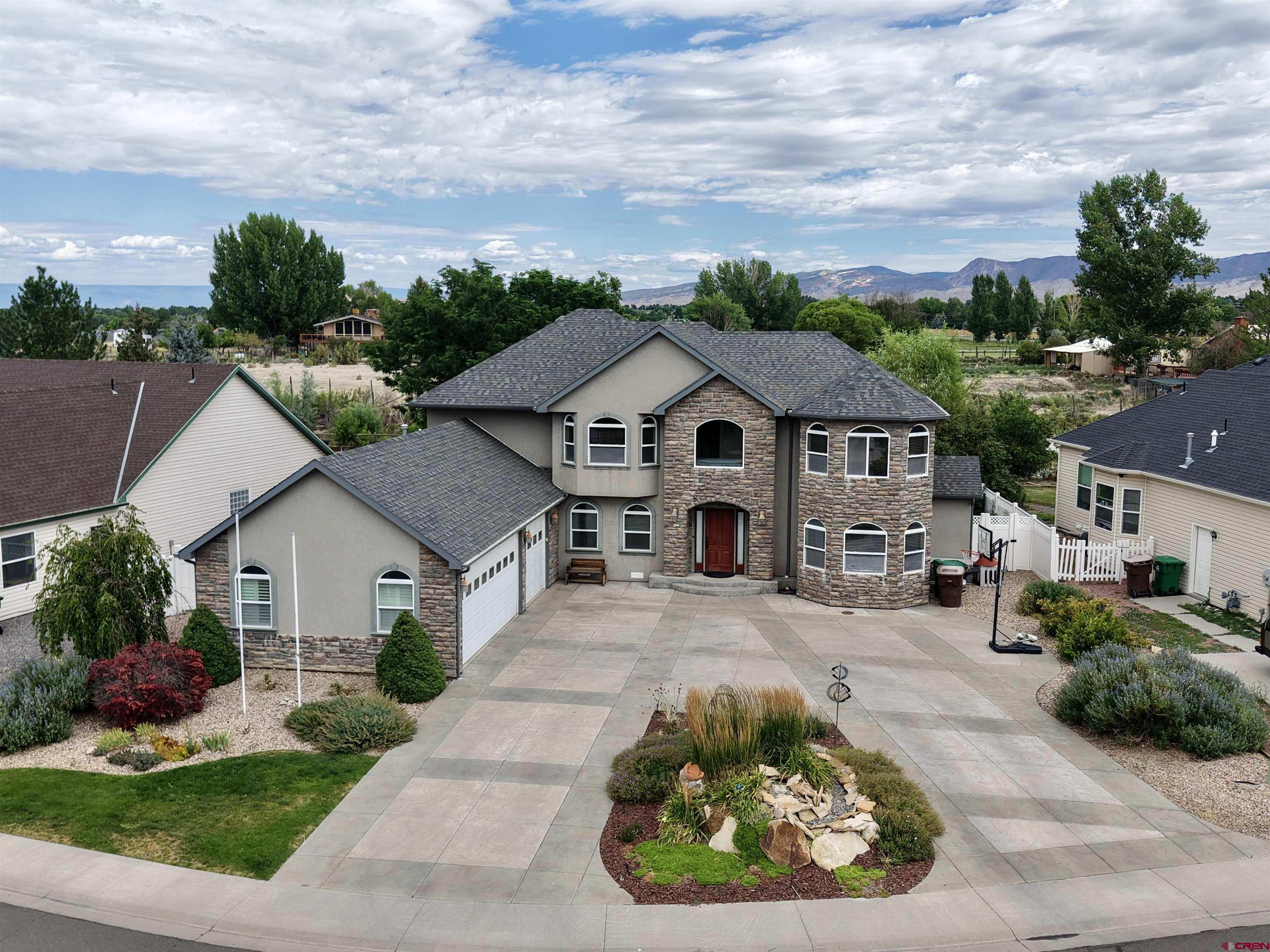 Come take a look at this stunning property that is sure to check the boxes right off your wants and needs list! Nestled in ‘The Preserve’ on the southeast side of town, you'll have amazing access to the surrounding amenities such as golf, shopping, public lands, restaurants, parks, community recreation center, river walkway, etc. On top of that, you’ll be situated on a large 1/3 of an acre lot in a sought-after subdivision with mature trees and landscaping surrounded by well-kept properties. This home is especially unique in that it backs up to a larger agricultural parcel that gets little to no use, and there is an existing hedge of greenery so it truly makes it feel that much more private and peaceful! This well-maintained home was custom designed and built, and it shows inside and out. The large stamped concrete driveway wraps around a landscaped water feature out front, which brings it all together for a spectacular and grand curb appeal. The home offers 2,814 sqft of living space with 4 bedrooms and 2.75 bathrooms. The main level has a mix of hardwood floors, carpet, and tile throughout. There is an abundance of both natural light and storage, which is surprisingly rare in many homes. The living room has direct access to one of the back patios and, of course, a natural gas fireplace with a stone hearth and surround. The kitchen is large and spacious with custom real wood cabinetry, and there is space for everything! If you need more space or simply want a different type of storage, don’t worry as there is a walk-in pantry off of the breakfast nook area where you’ll also find a sliding door for additional access to a separate back/side patio. On the opposite end of the main level, there is an oversized room with a walk-in closet that could serve as many different uses from a workout room, bedroom, game room, craft room, school room, home office, and potentially even an additional primary suite on the main level if you included access to the 3/4 bath that’s already adjacent to the room. On the upper level, you’ll find 2 more bedrooms that share a full bath but are separated by a hallway that contains a reading/lounging nook complete with a daybed that has built-in storage underneath and on the surrounding walls with a large south-facing picture window where you can see the San Juan mountains! The primary suite is huge with windows at both ends of the room, a large walk-in closet, and a sprawling ensuite. The ensuite has a doorless entry into the large tile-surround shower, a large jetted tub, dual vanity, separate water closet, and linen closet. Outside, you have beautiful mature landscaping, privacy fencing, a storage shed, raised garden beds, and perhaps one of the neatest features you may have ever seen in a home…a pet room that is attached to the home with outdoor access complete with heating/cooling, water, and electricity! This room could be used for additional storage or a work room as well. Don’t miss your chance at this one….call today for your private showing!