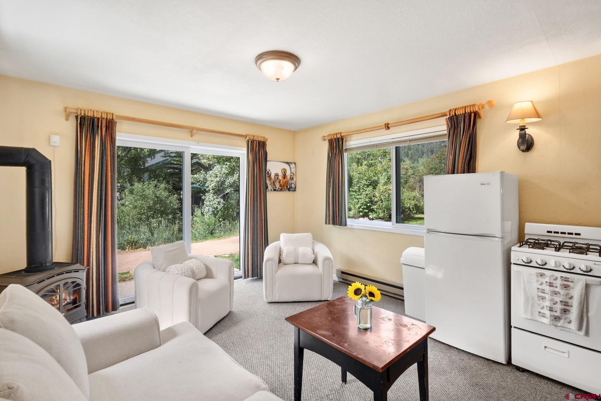 One of the most unique studios in Viking Lodge—this end-unit juts out from Building B, flooding the space with natural light on all four sides. Step off the south facing extended patio right onto the River Trail for instant access to skiing and hiking. Enjoy efficient gas heating, a remodeled bathroom (2021), and new doors and windows (2024). With solid bones, this property is a blank canvas for your client to design their dream mountain retreat that offers strong short-term rental potential in a high-demand location.  Some photos of this listing may include virtually staged amenities, furniture or fixtures.