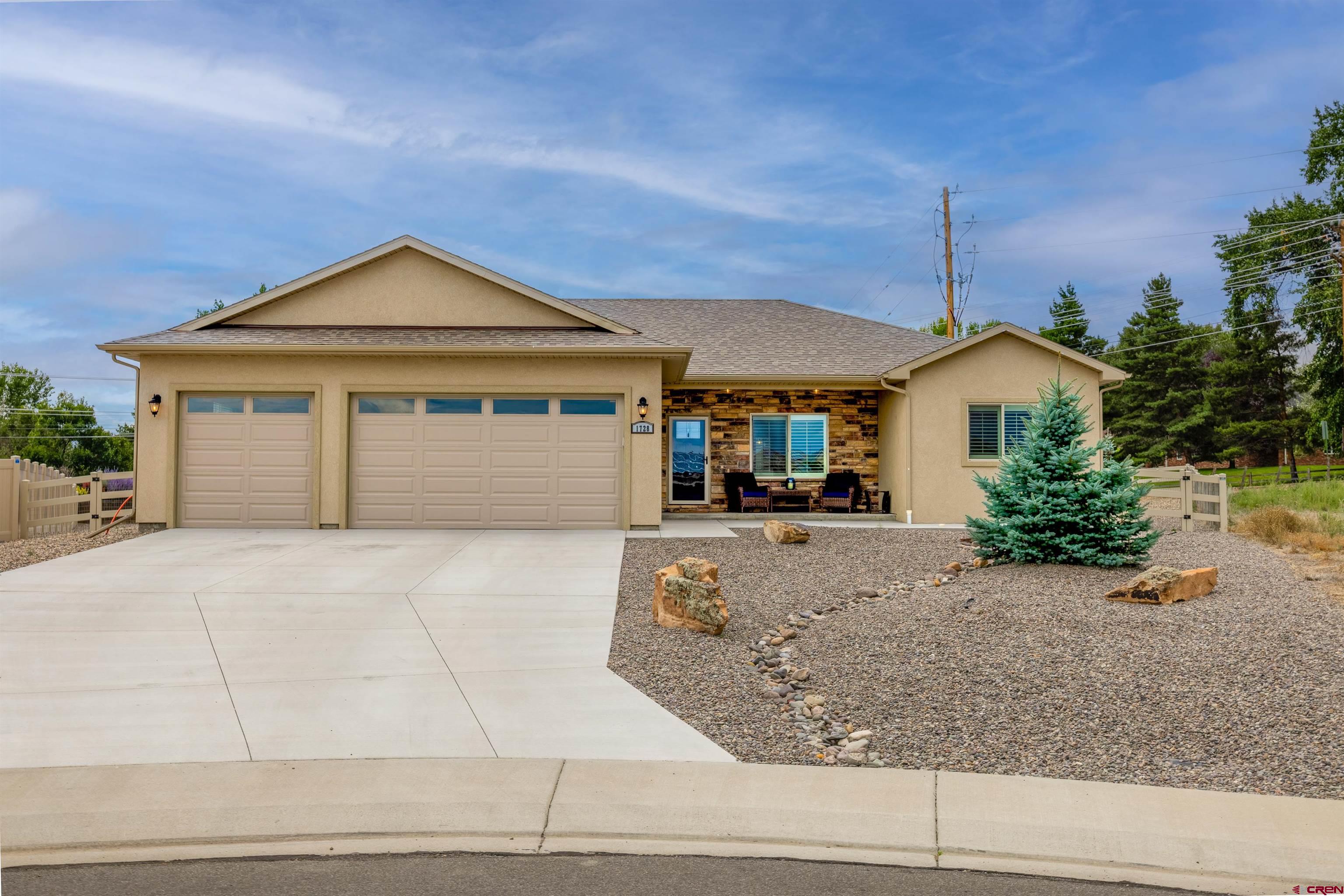 Welcome to 1728 Keller Court — a move-in ready gem in the Estates of Stone Ridge! Looking for a home that truly checks all the boxes? This beautifully upgraded 3-bedroom, 2-bath home with a 3-car garage sits on a generous .36-acre corner lot at the end of a quiet cul-de-sac. With over $74,000 in thoughtful upgrades, this home is designed to elevate everyday living. Enjoy low-maintenance xeriscaping, a whole-house water filtration/softener system, a tankless water heater, and Pottery Barn lighting throughout. High-end finishes include custom wood shutters, granite countertops, a tile and vinyl plank flooring (no carpet!), and stainless steel appliances. The open-concept floor-plan offers abundant natural light, a spacious living room with a cozy gas fireplace, and an inviting kitchen with a large pantry and breakfast bar. The split-bedroom layout. The expansive primary suite features a fully tiled walk-in shower, his-and-her vanities, and a large walk-in closet. Enjoy Colorado’s sunshine on the welcoming front porch, or entertain guests on the expansive back patio, complete with a concrete pad ready for your pergola. The fully fenced backyard is ideal for kids, pets, or simply relaxing with mountain views in the background. The garage is EV or workshop-ready with 220V power. Location is everything, and this home delivers! You're just minutes from the Montrose Rec Center, Cottonwood Elementary School, shopping, dining, and outdoor recreation. Montrose is where small-town charm meets big-time adventure. With stunning mountain views, a welcoming community, vibrant local events, and access to world-class hiking, skiing, and fishing, Montrose is a lifestyle choice you’ll love coming home to. Don’t miss your chance to own this turn-key beauty in one of Montrose’s most desirable neighborhoods! Schedule your private showing today!