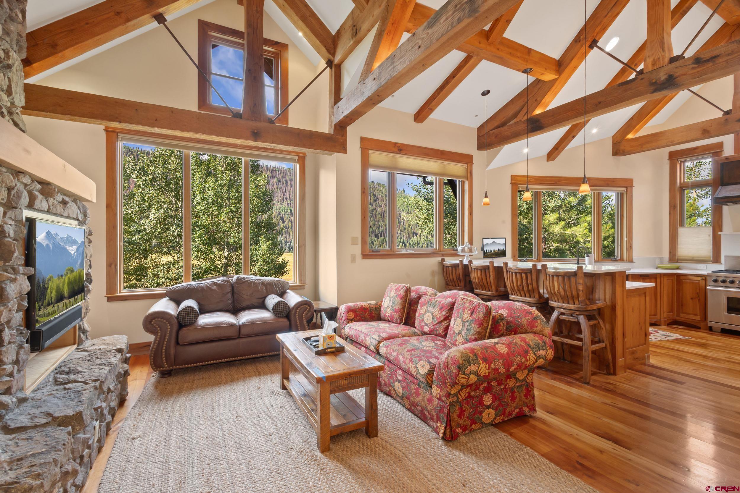Experience the ultimate Colorado mountain lifestyle without the Telluride price tag! This modern timber frame accented, four bedroom home, perfectly situated just two miles from the vibrant town of Telluride, offers an appealing blend of luxury, convenience, and natural beauty. This is your chance to own a piece of paradise for about 50% less than the cost of an in-town Telluride property, all while enjoying the same breathtaking surroundings and world-class access. For the outdoor enthusiast, this location is a dream come true. You're directly on a bike path to town, and just across the street from forever wild open space, your personal playground for biking, hiking, and Nordic skiing. Call to discover the incredible value of this Telluride adjacent home.