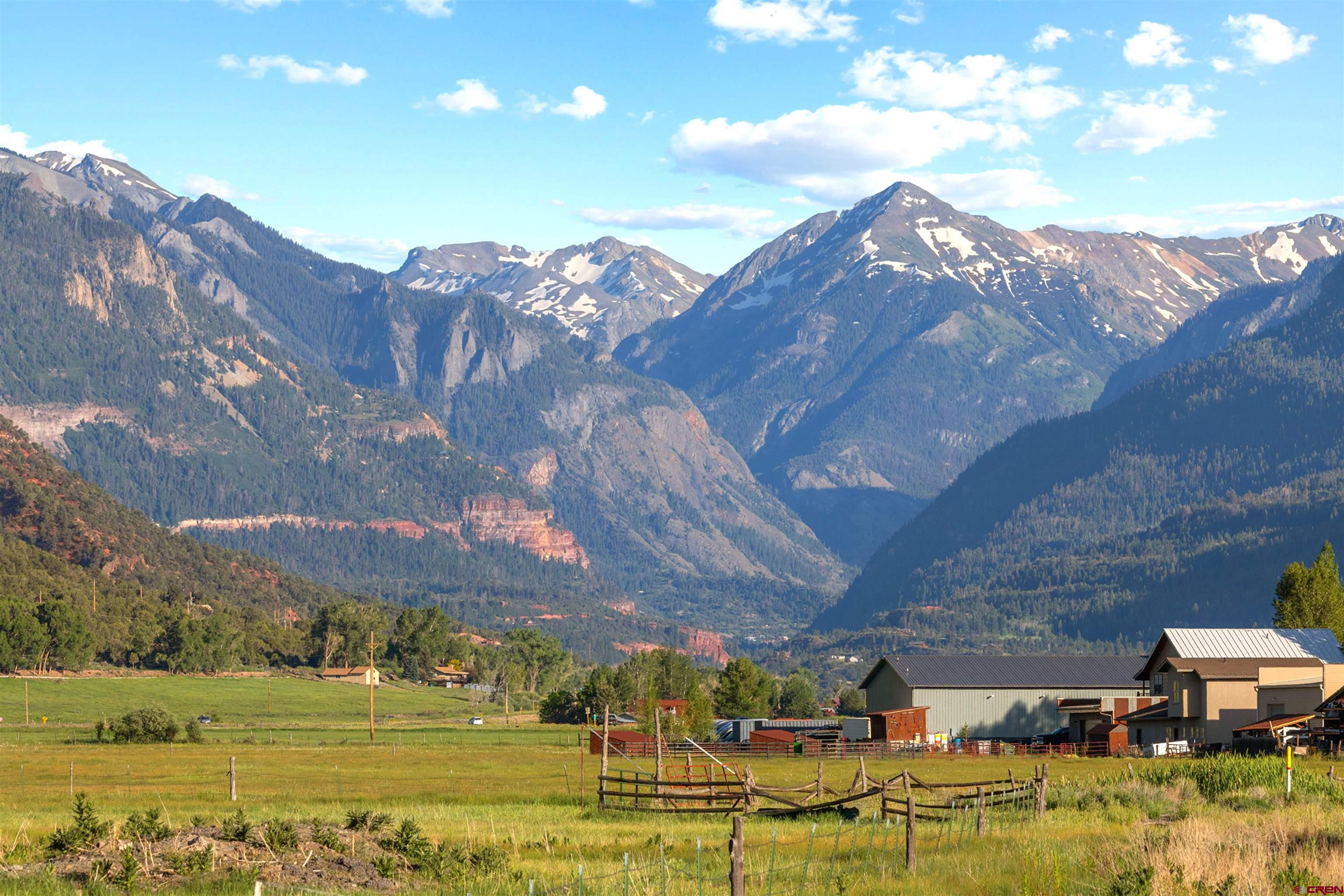There are a total of 23 properties. Homes 1-10 in the first phase is sold out. Phase 2 has 13 more properties. Three homes are finished with one under contract. This listing is 2 Bedrooms,2 Baths with a deck off the back .The front deck has views of the mountains.