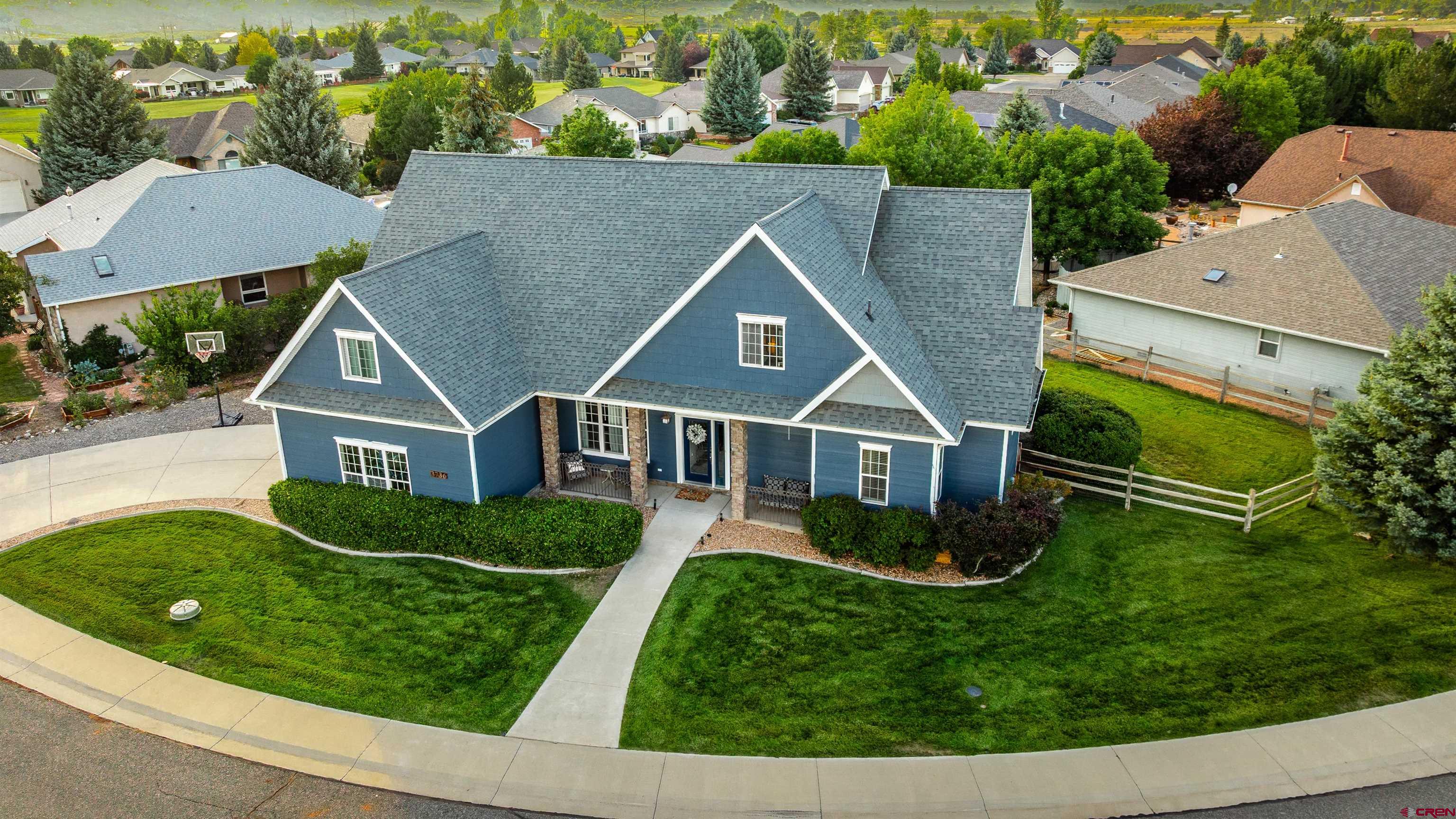 This stunning residence in the sought-after Cobble Creek Golf Community is full of unique character and thoughtful touches throughout. From the moment you arrive, the inviting curb appeal sets the tone for the warm and welcoming home that awaits inside.  Step through the bright entryway into an open and airy layout featuring vaulted ceilings, abundant natural light, and seamless flow between the living, dining, and kitchen areas. The kitchen is both stylish and functional, offering bar seating, a cozy breakfast nook, generous cabinetry, and ample counter space—ideal for both everyday living and entertaining.  To the right, discover a flexible primary suite with a charming spiral staircase leading to a flex space—perfect for a home office, reading nook, or creative retreat. The primary bath and walk-in closet complete this serene haven in the desirable split floor plan.  On the opposite side of the home, a second bedroom is adjacent to a full hall bath with convenient access to the back patio—perfect for guests or entertaining.  Upstairs, beyond the overlook to the main level, you'll find two spacious bedrooms featuring window seats and built-in storage, plus an additional versatile flex space ready to fit your lifestyle needs.  Outside, enjoy a beautifully maintained backyard and an attached two-car garage—rounding out this exceptional property.  Don't miss your chance to own this one-of-a-kind home in Cobble Creek. Let’s bring you home today!