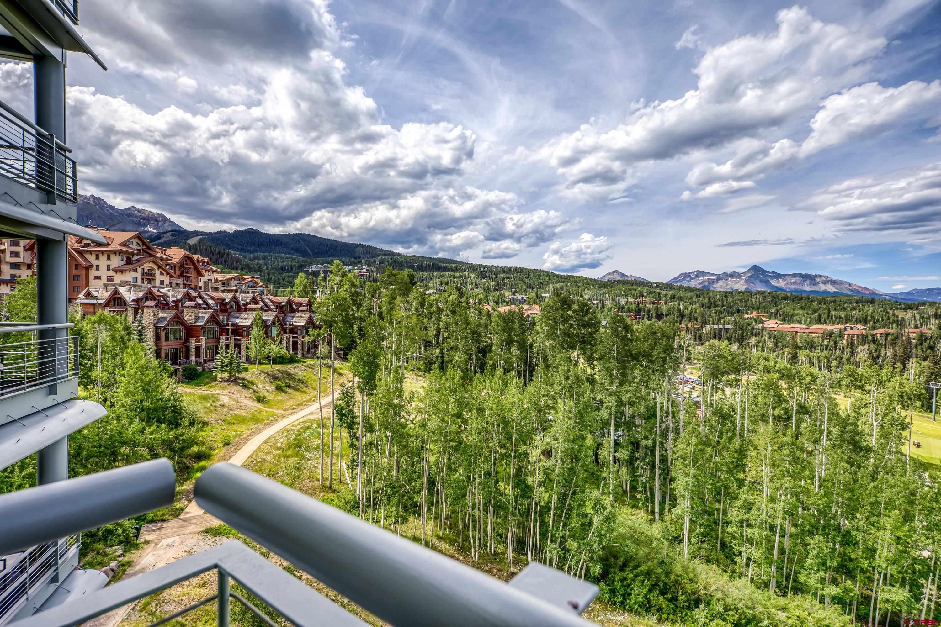 Welcome to The Peaks, 136 Country Club Dr, Telluride — Units 542 & 544 — a rare dual offering within the renowned Peaks Resort & Spa, an exquisite retreat nestled in the heart of Mountain Village. These unique residences present a turnkey opportunity for transformation, with fully approved plans for a complete remodel already in place for Unit 544. Whether you're looking to create a luxurious personal escape or a premium, income-producing investment property, this is a canvas ready for your vision. Set at 9,417 feet and just steps from the world-class Telluride Golf Club, this alpine haven offers the finest in mountain living. As part of the Peaks Resort, owners enjoy access to Colorado’s largest spa — a 40,000-square-foot sanctuary of wellness and relaxation — right at their doorstep. From teeing off on one of North America's most scenic golf courses, carving fresh tracks on the legendary slopes of Telluride Ski Resort,  to unwinding in a world-class spa environment, this is mountain lifestyle at its most refined.  Elevate your expectations with this unparalleled opportunity to curate an elegant alpine residence within one of Telluride’s most sought after and amenity-rich resort destinations. (See photos 4 & 5 for model representation of approved remodel plans.)