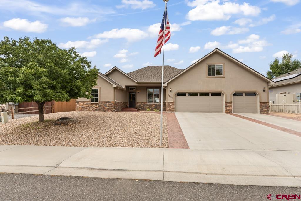 Welcome to 1530 American Way, a beautifully maintained home located in the desirable American Village subdivision. This charming residence features 3 bedrooms and 2 bathrooms, thoughtfully designed for both comfort and functionality. Situated in a quiet cul-de-sac, the home offers added privacy and a welcoming neighborhood atmosphere. Step inside to discover a spacious layout highlighted by a main-floor master suite and stylish finishes throughout. The kitchen is a true centerpiece, featuring granite countertops, ample cabinetry, and an open flow that's perfect for entertaining or everyday living. Large windows invite natural light, creating a warm and inviting space. Pride of ownership is evident inside and out, making this property truly move-in ready. With its ideal location, quality finishes, and functional floor plan, this home is an excellent opportunity to enjoy the best of American Village living.