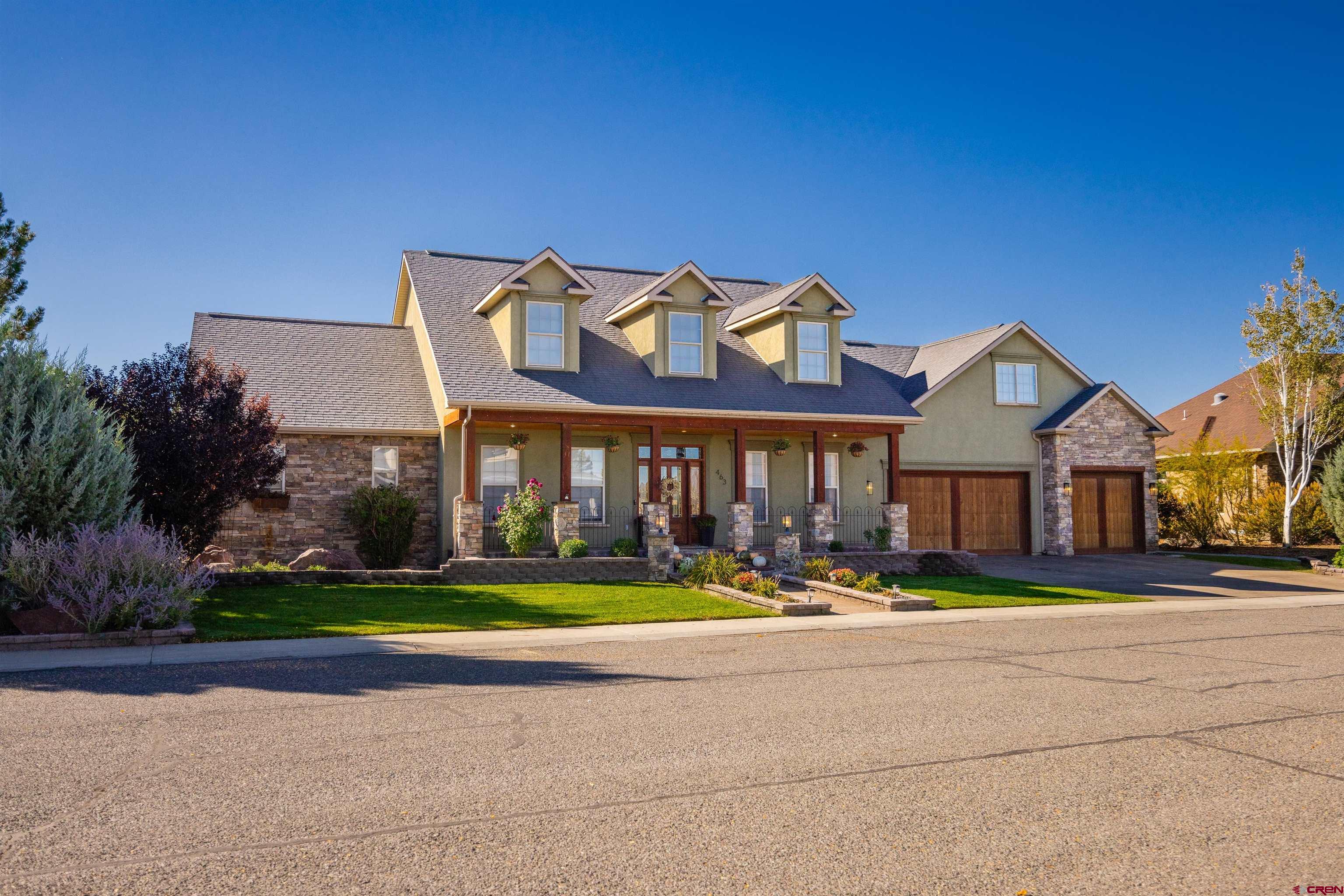 Refined Golf Course Living with Mountain Views – 463 Cobble Drive, Montrose, CO  Situated in the prestigious Cobble Creek Golf Course community, this stunning 3,550 sq ft home blends timeless design with "Mountain Modern" comfort. Featuring 4 bedrooms, 3.5 bathrooms, a dedicated office, and a spacious 3-car garage, this property also includes a 650 sq ft bonus room—ideal for a home gym, media room, Art room, or extra guest space.  Enjoy the ease of main-floor living with a luxurious primary suite that opens directly to the backyard. Wake up to golf course frontage, open green space,  & views of the San Juan Mountains—a truly private and peaceful setting.  Recent updates throughout include new countertops, backsplash & paint in the  kitchen, new flooring, and freshly painted baseboards on the main level. The upstairs bathroom has been beautifully remodeled, and a custom metal staircase railing adds a truly unique architectural touch.  Inside and out, this home delivers impressive curb appeal, elevated finishes, and a layout perfect for both entertaining and everyday living. All of this in one of Montrose’s most desirable neighborhoods, just steps from the golf course, walking trails, and community amenities. This home also has a Cobble Creek Social Clubhouse Membership.   Schedule your private tour today.