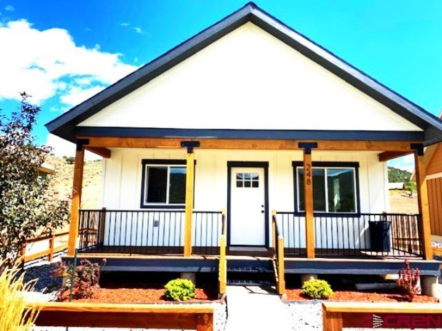 Affordable cottage homes in southwest Colorado.Rare opportunity to own a charming one bedroom cottage only about 35 minutes from Telluride. Thoughtfully designed with a friendly community feel.Perfect for retirees,first time buyers or young professionals working in the Telluride area. This is a price point that is rarely available in the entire region. These cottages offer both lifestyle and value. The Club House offers an area for meetings birthday parties and more.It features a bathroom and kitchen. An over sized hot tub area is fenced in and has a lounging deck. This house has one assigned parking space and one 5'x8'x8' storage space. Very dog friendly! Also,each deck has a view of the mountains.