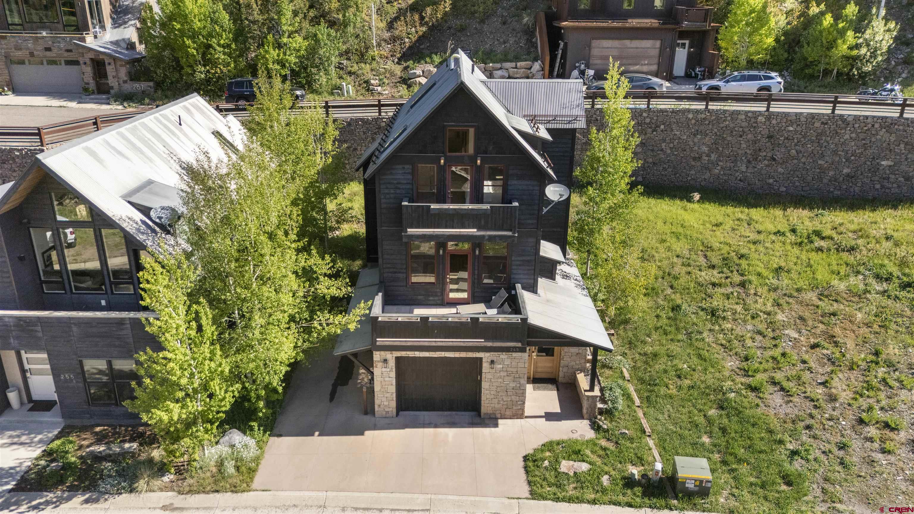 Ideally located just two miles from the heart of downtown Telluride, this 4 bedroom, 3.5 bath residence blends convenience with breathtaking surroundings. Enjoy easy access to town via the bike path or bus route, while also savoring the privacy and added sunshine that the Sunset Ridge subdivision provides. Located across from the protected Valley Floor, this home offers views of Telluride's most iconic open space and is bathed in natural light throughout the day. This is a rare opportunity to own a slice of Telluride luxury.