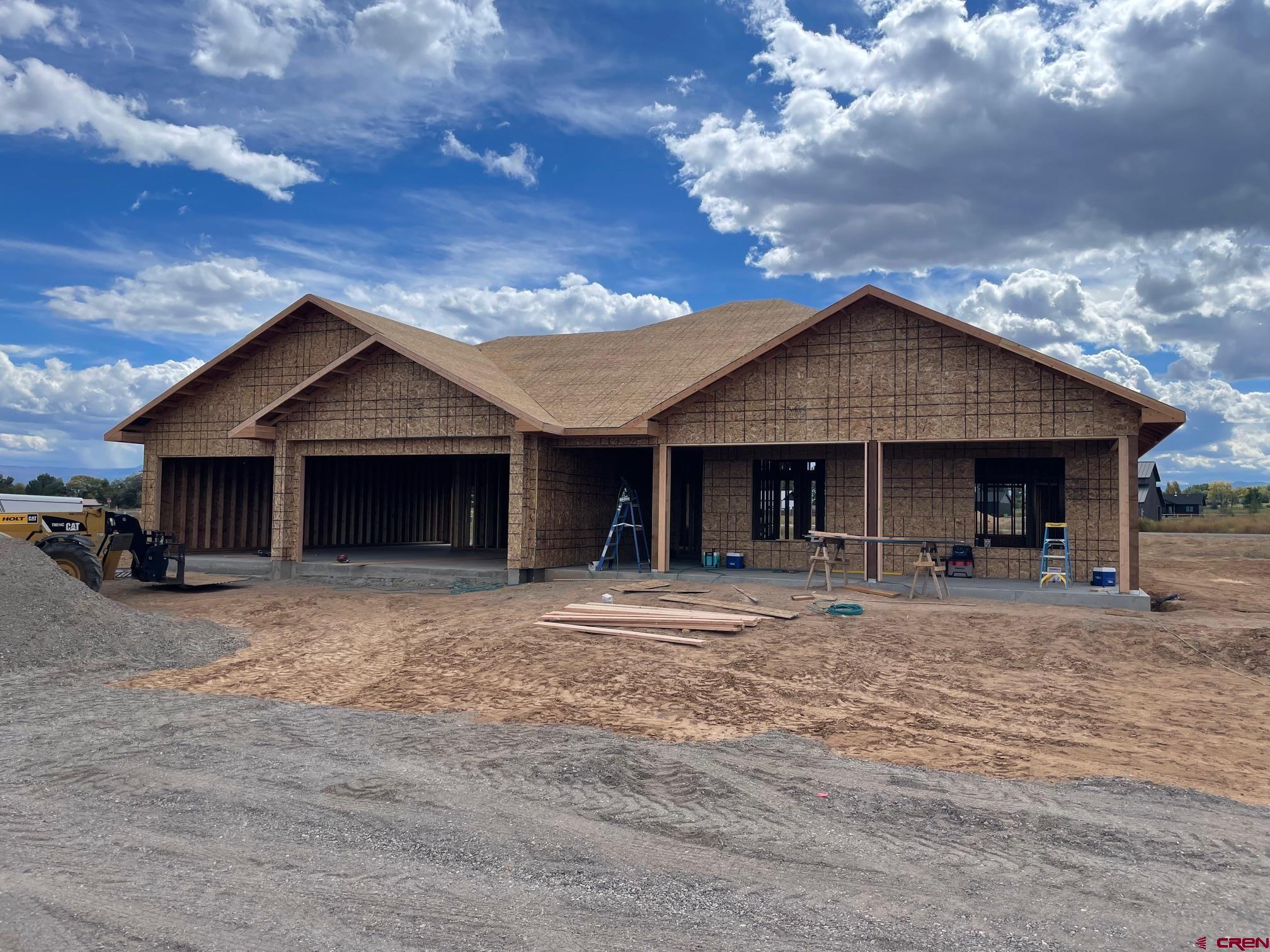Spectacular new custom home in West Valley Estates on Spring Creek Mesa. This charming one-level open floor plan home is located on a beautiful setting with mountain views and irrigation water. This home features hardwood floors in the main living area, granite countertops, Stainless kitchen appliances, gas fireplace, vaulted ceilings, laundry room sink, tile floors in entry, laundry, and bathrooms. Master suite offers walk-in shower, double vanity sinks, stand-alone tub, and walk-in closet. The oversized 3-car garage features an additional 14’x18’ tandem bay that can be used for a 4th vehicle, atv’s, shop area, or additional storage.  Additional features include stucco & stone exterior, conditioned crawlspace, over excavated foundation, covered front and back patio with stamped concrete, metal T&G ceiling, and gas stub. One of the most exciting features of this home is a “state of the art” 8 KW solar power system that is connected to the power grid. There is plenty of room for a shop or barn, and covenants allow RV parking, chickens and 4H animals. Completion date is scheduled for February 15, 2026.