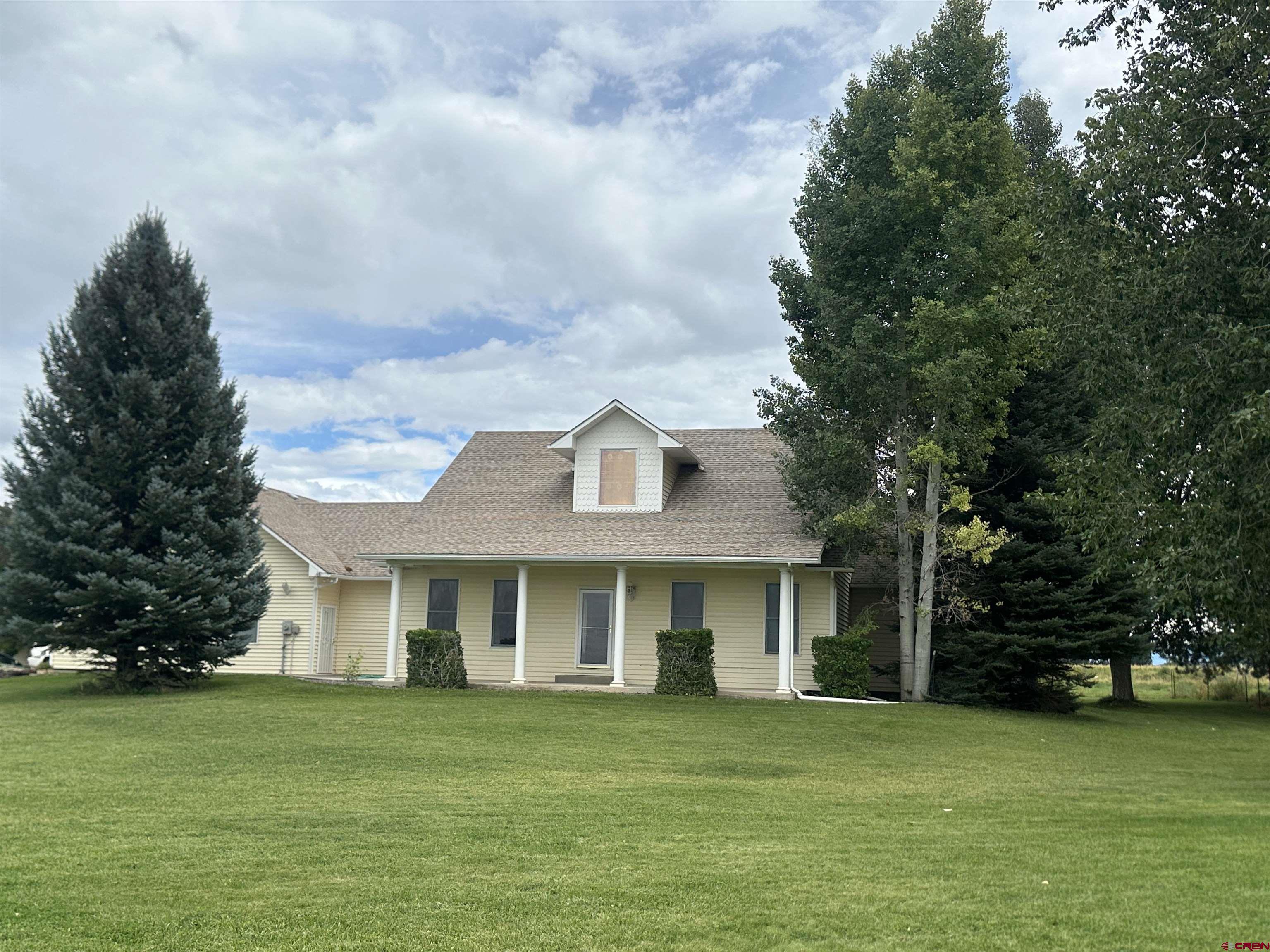 3 bedroom, 3 bath, 2,507 sq.ft. home sits on 5.9 irrigated acres with Southern views of the San Juans, what more could you ask for? This home is located on Spring Creek and is well set up with a large open kitchen to living room area which is accented by a gas log fireplace. The kitchen has ample amount of cabinet and counter space. There is enough room for a large dining table as well a breakfast nook with windows looking out to the backyard and mountain views. The primary suite has a jack and jill sinks, soaker tub, walk in shower, and spacious walk-in closet. Enjoy natural light from the large windows throughout the home as well! Downstairs you will find the basement where you could turn it into any space you would like, game room, entertainment area, or bedrooms. The lower level is accompanied with a full bathroom. The home has a 3-car garage with one bay that has been converted into a game room/ storage area as well as part of it being a spot to park your lawn mower and tools. Outside you will find a covered front patio as well as a covered back patio. The property has mature trees and fruit trees. There is also a storage shed to help store all your items. The irrigated pasture is an added bonus to this already great property!