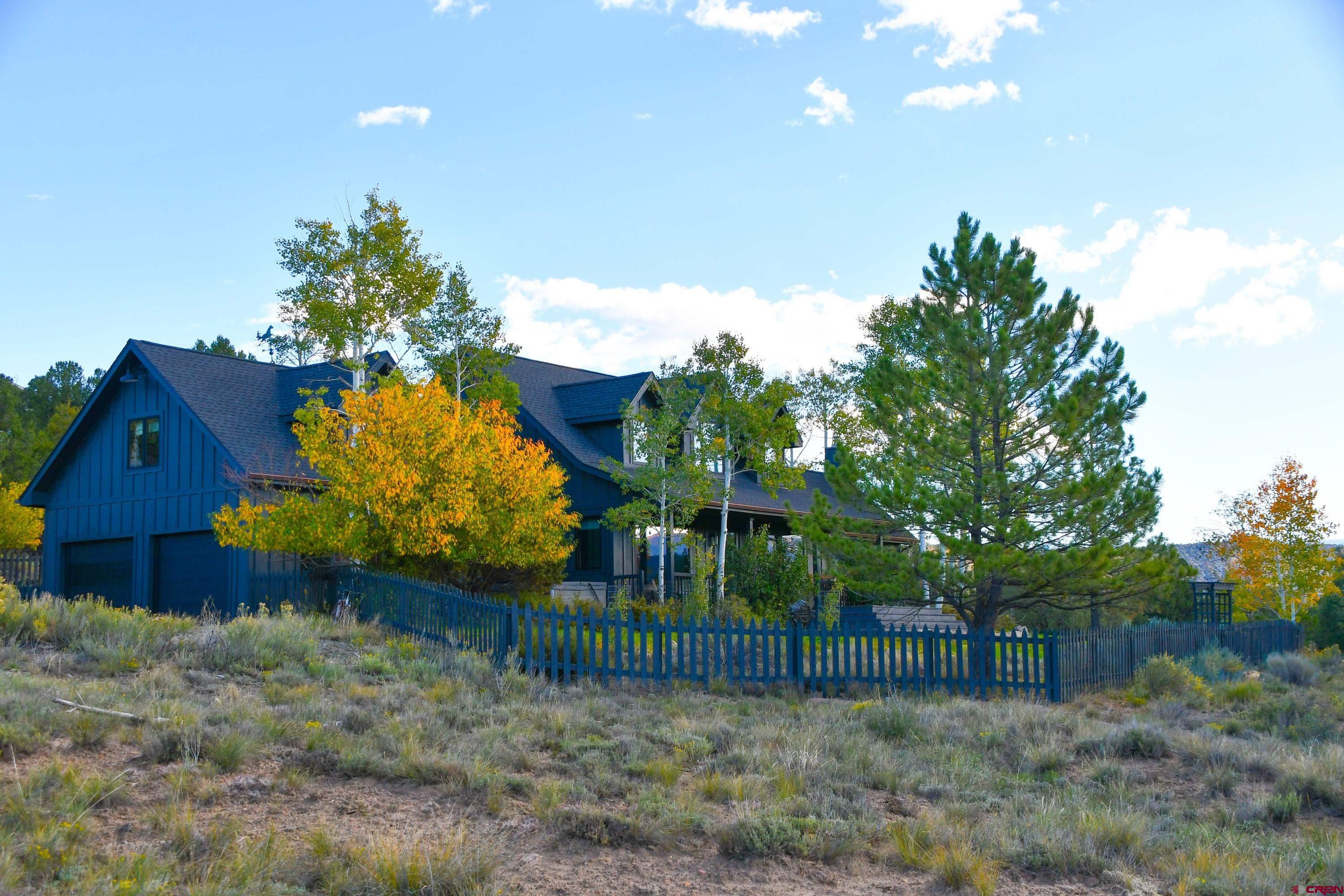 Elegant Pleasant Valley Retreat  Step into timeless elegance in this beautifully crafted 3-bedroom, 3-and half bath home with a versatile flex room, nestled on approximately five acres in the heart of Pleasant Valley. Finished in 2021 with a classic yet timeless appeal, this home is thoughtfully designed to showcase the incredible mountain and valley views from every angle.  Imagine the lifestyle: a bonus room that can become your home office, personal gym, or cozy home theater. Inside, you’ll find custom white oak flooring sourced from Cortez, Colorado, beautifully crafted local cabinetry, and a striking custom leathered quartz island with quartz countertops. Comfort is ensured year-round with a fully updated HVAC system that includes whole-house air conditioning and a whole-home humidifier.  Then step outside to your private outdoor wellness oasis, complete with a luxury hot tub, a cold plunge, and an outdoor shower offering both hot and cold water. Picture unwinding under the stars in your own private spa retreat.  Now, think about where you’ll store all your seasonal toys and gear. Can you see a spacious two-car garage that easily fits everything from your winter sports equipment to your summer adventure gear? And imagine the potential of those five expansive acres with expansive San Juan including Mt. Sneffles and Cimarron Range Views, potential to add a detached shop or garage, and truly make this property your own.  And here’s something special: your new home overlooks some of Ridgway, Colorado’s most iconic ranches, including the renowned Ralph Lauren’s property. Imagine the prestige and inspiration of living in such a scenic and storied region.  And imagine living just minutes from Ridgway, a short drive from Telluride’s world-class skiing, and close to all the amenities of Montrose. This is a home that offers not just a place to live, but a lifestyle to embrace.  Welcome to a property that’s truly one-of-a-kind. Can you see yourself here?