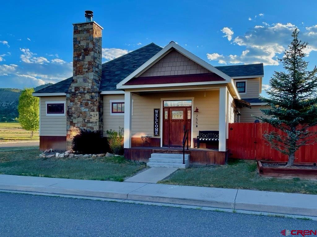 Custom Home in Premier Ridgway Neighborhood Located on a desirable corner lot, this spacious custom home offers mature landscaping, a fenced side and backyard, and inviting outdoor living spaces.   The gourmet kitchen is a true highlight, featuring a 36" Wolf duel fuel range with oversized, stainless steel Wolf range hood and complete suite of KitchenAid stainless steel appliances, including refrigerator/freezer, dishwasher, microwave, warming drawer, and ice machine. A large center island, granite countertops, custom cabinetry, and elegant built-ins make this kitchen as functional as it is beautiful. Generously sized bedrooms all include walk-in closets, while the versatile 4th bedroom/bonus room provides abundant storage and can serve as a recreation room, guest suite, or office. Hardwood floors, natural stone tile and abundant natural light enhance the home's warm and inviting atmosphere.  Additional features include central heat and air, plentiful storage and a 3 car garage. This property combines luxury and practicality in one of Ridgway's most sought-after neighborhoods- an ideal place to call home.