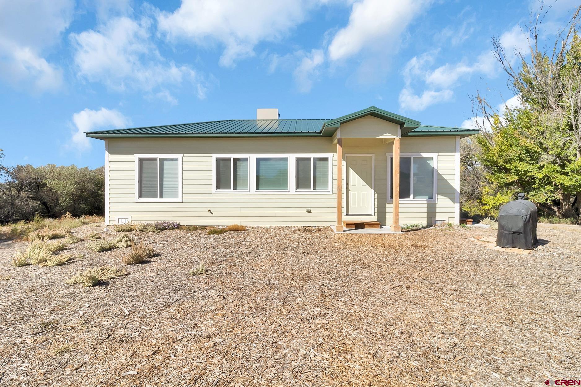 Check out this versatile property just outside of Delta city limits that offers 19.7 shares of UVWUA irrigation water to utilize on your 35.8 acres. There a (2) Two large shops as you enter the property that would provide a myriad of uses and has sufficient electric amperage to operate. Pull through large 12x12 garage door. The 2 bed, 2 bath home was built in 2023 and is turnkey ready with tall ceilings and in floor radiant heat! No covenants or HOA to regulate how you use the property. Good privacy and seclusion. Deer and Quail frequent the property.