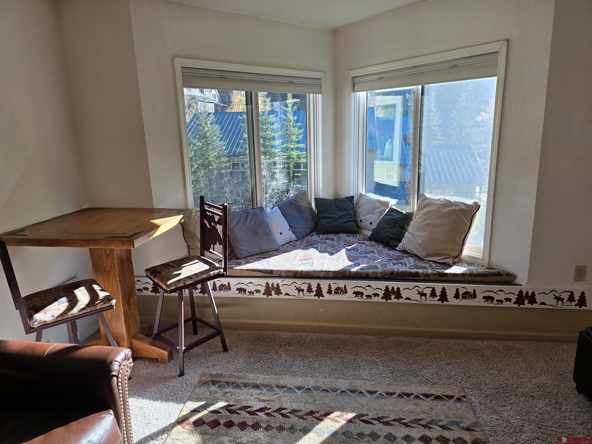 Least expensive Viking Lodge unit listed as of 10/21/25. First time on the market in 20 years. Mostly original condition 1-bedroom with bunk bed alcove, 1-bath, 498 sq. ft., top floor, riverside unit with excellent views of the San Miguel River & mountainside. Walking distance to grocery store, restaurants, gondola, ski lift #7, downtown Telluride, and on the free Galloping Goose bus route. Viking Lodge amenities include outdoor pool, hot tub, laundry facilities, elevator, and off-street parking.