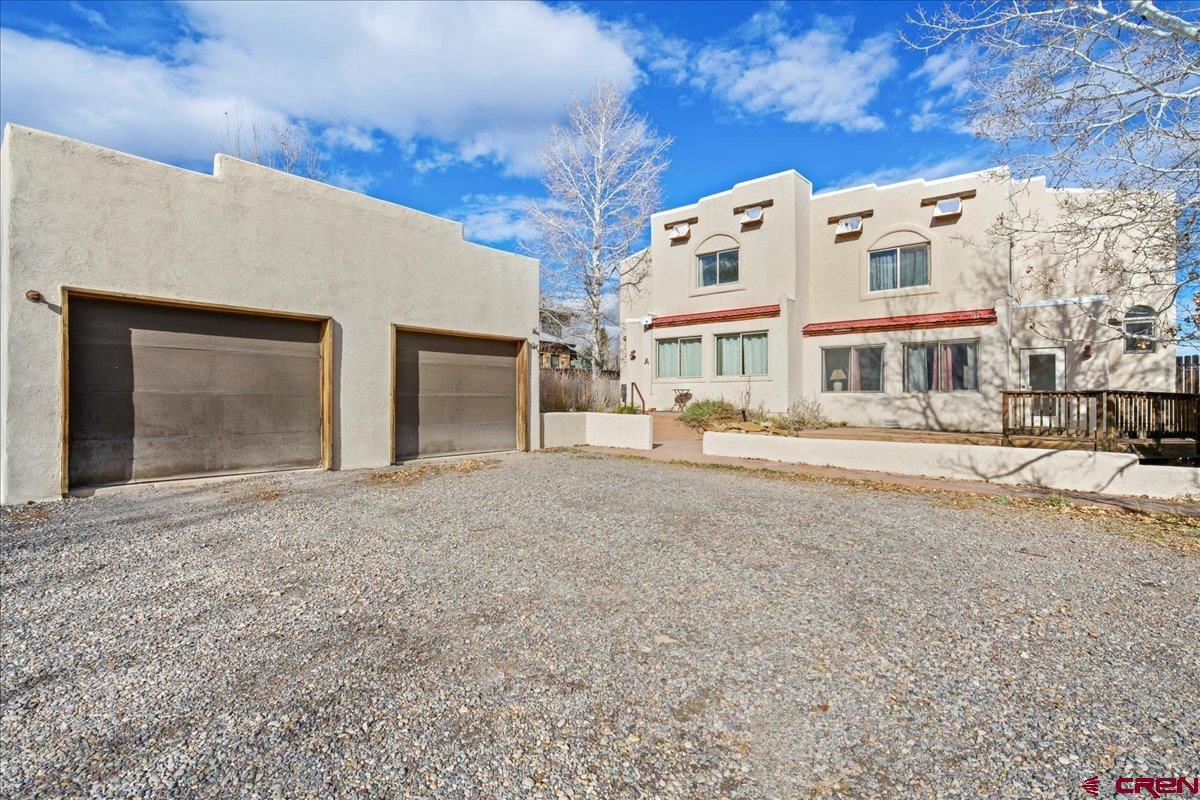 Located in the Town of Ridgway within the prime community of Solar Ranches.  Location, Location, Location, as well as Options, Options, Options.  Historically this well-built duplex has been both a long-term residence and long-term rental.    Each unit has 3 bedrooms and 2.5 baths.  Each unit has its own private front entrance, and privacy fenced backyard.  Large windows make for sunny rooms and beautiful views.   Recent upgrades include stylish wood flooring and new appliances. Options for buyers are to continue using the duplex as investment property or to live in one side and rent the other side.   It would also be a wonderful family retreat for year round living on one side, and vacation space for family and friends on the other.  Mature landscaping includes lilac trees, drought-tolerant gardens, and large aspens.  Easy walking and biking distance to the park, market, restaurants, Post Office, schools, and shops.  Enjoy all of the beauty that the Cimarron and San Juan Mountains offer.  45 minutes to Telluride,  30 minutes to Montrose,  20 minutes to Ouray.