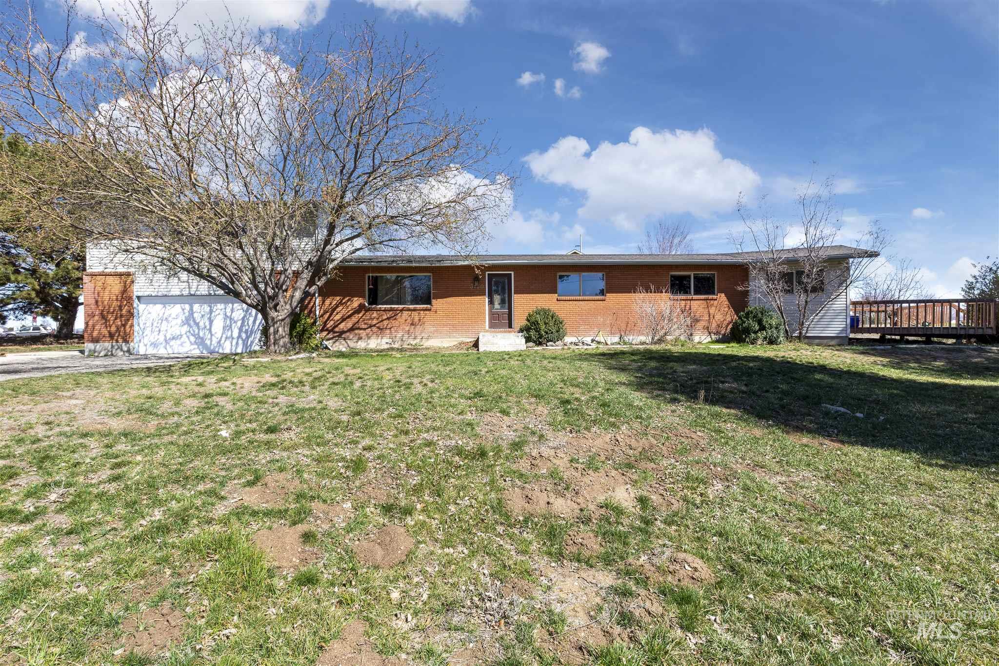 Bring your Horses and or your cattle to this 3 acre property! This home has 3 MASTER BEDROOM SUITES IN IT. Enjoy having no CCR's and plenty of room to play.  ENJOY YOUR 2000 SQ FT SHOP!!. A private mother in laws suite as well. Lots of opportunities and options for this property.  According to the city the Property can be split after going through the proper channels. Strongly encourage buyer to do their own due diligence.  BBATVAI.