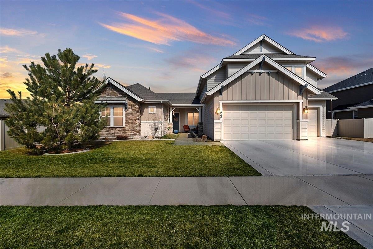 This stunning home in the highly desired Fall Creek Sub is loaded with upgrades! Hardwood floor, granite counters, large island with breakfast bar, built in range, coffee bar, oversized bedrooms and an extended 4 car garage. Bonus room can easily be turned into a 4th bedroom or theater room and has its own full bath. Backyard has a large covered patio and extended flagstone sitting area with a beautifully designed waterfall. Master bed, main living area and bonus room all have separate climate controls.