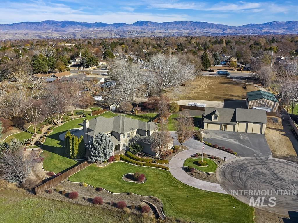 Rare opportunity to own a custom Estate home on 2 acres without CCR's in West Boise with detached shop and studio apartment. Park like estate lot. Seasonal creek through the backyard. In-ground pool, hot tub, outdoor kitchen. Located adjacent to the Traditions subdivision. Home is 6,101 sqft. 4 bed, 3.5 bath. 2 story w basement. Large gourmet kitchen w Thermidor appliances, custom cabinets. Entertainers delight inside and out. Spa like master suite w air jet tub and steam shower. Functional elevator to all 3 floors. Amazing Theatre room w bar. Pool table room and Gym. 5 car garage attached to home. Detached additional 3 car shop plus double RV garages and 665 sqft rentable / income producing studio apartment with private access. Storage shed. In addition to home and apartment bathroom count, there are additional half baths in attached garage and in the shop. Too many upgrades, amenities and features to list. Heated Pool w waterfall and hottub are amazing, fully functional and have been winterized for the sale - Tim J Jessen, Voice: 208-890-6369, Fathom Realty, Main: 208-576-4717,