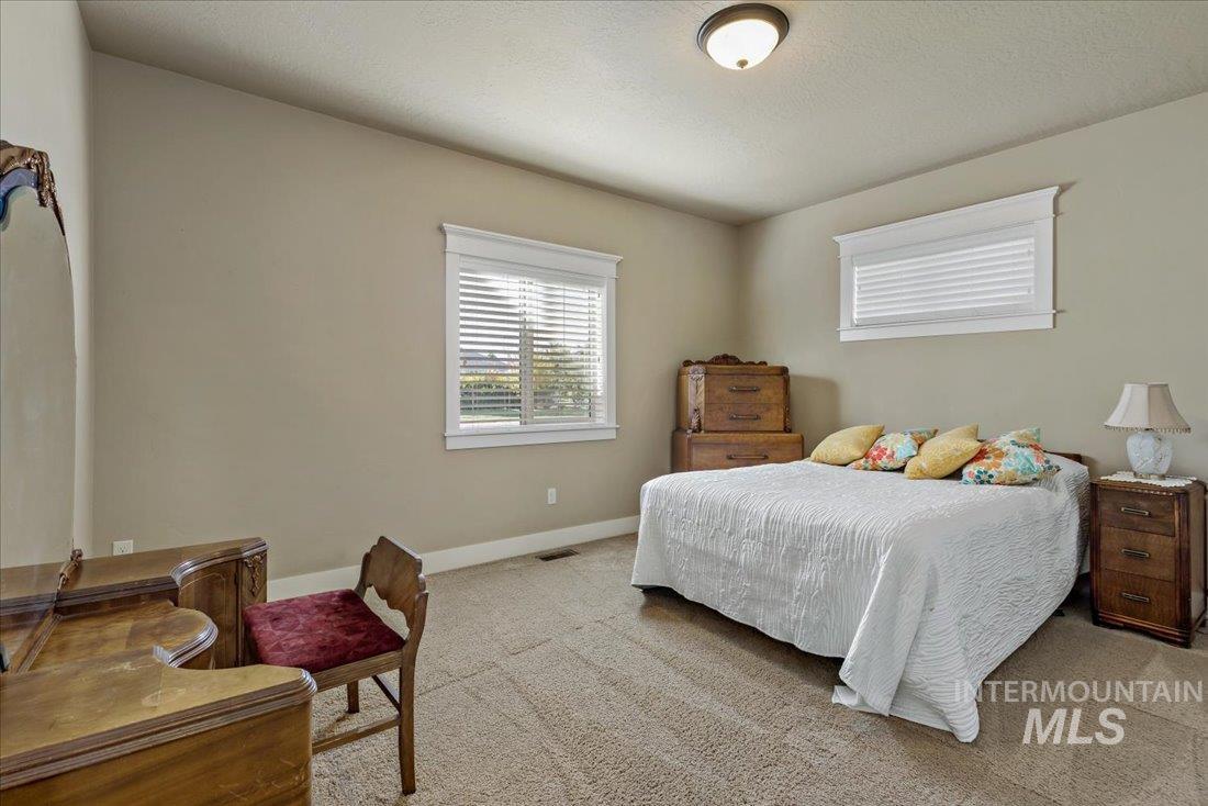 17296 Stiehl Creek Drive, Nampa, Idaho 83687, 5 Bedrooms, 2.5 Bathrooms, Residential For Sale, Price $899,900,MLS 98909375