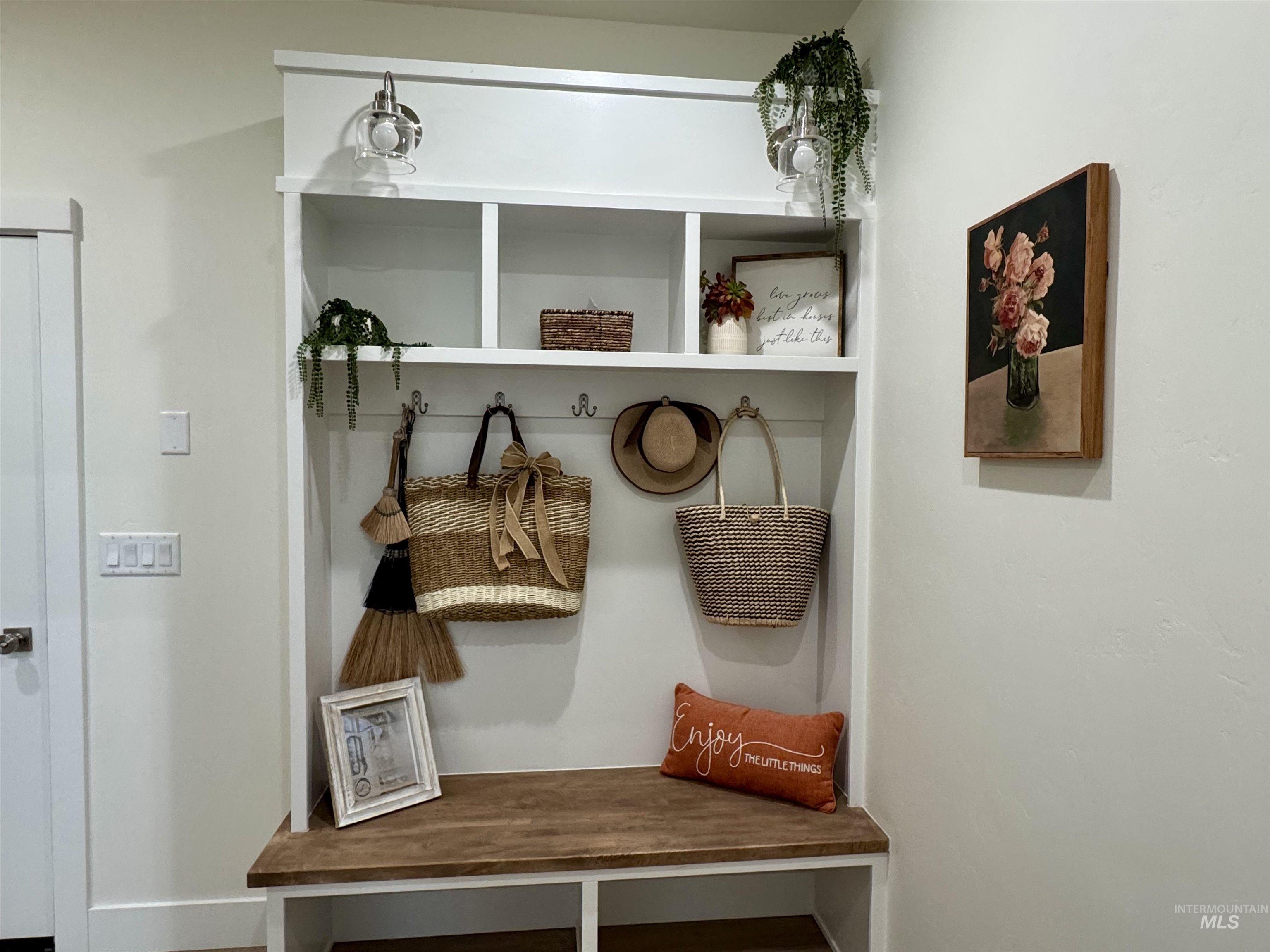 Mudroom featuring baseboards