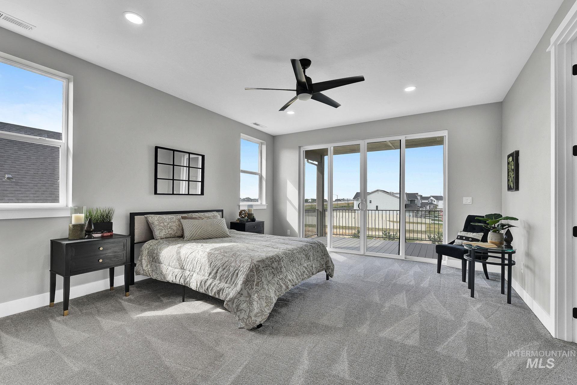 Bedroom featuring light colored carpet, ceiling fan, access to exterior, and recessed lighting
