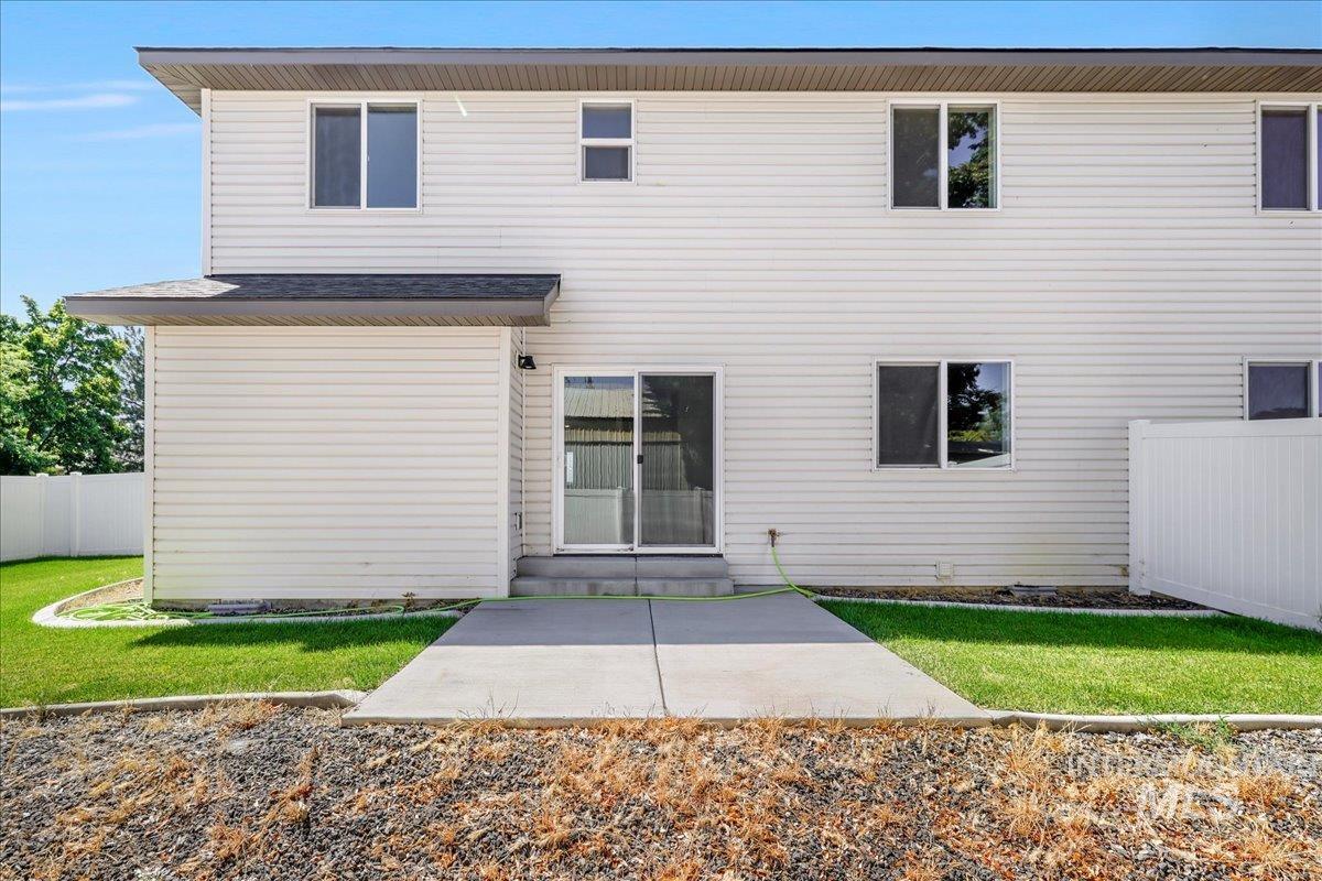 Rear view of house with a patio area