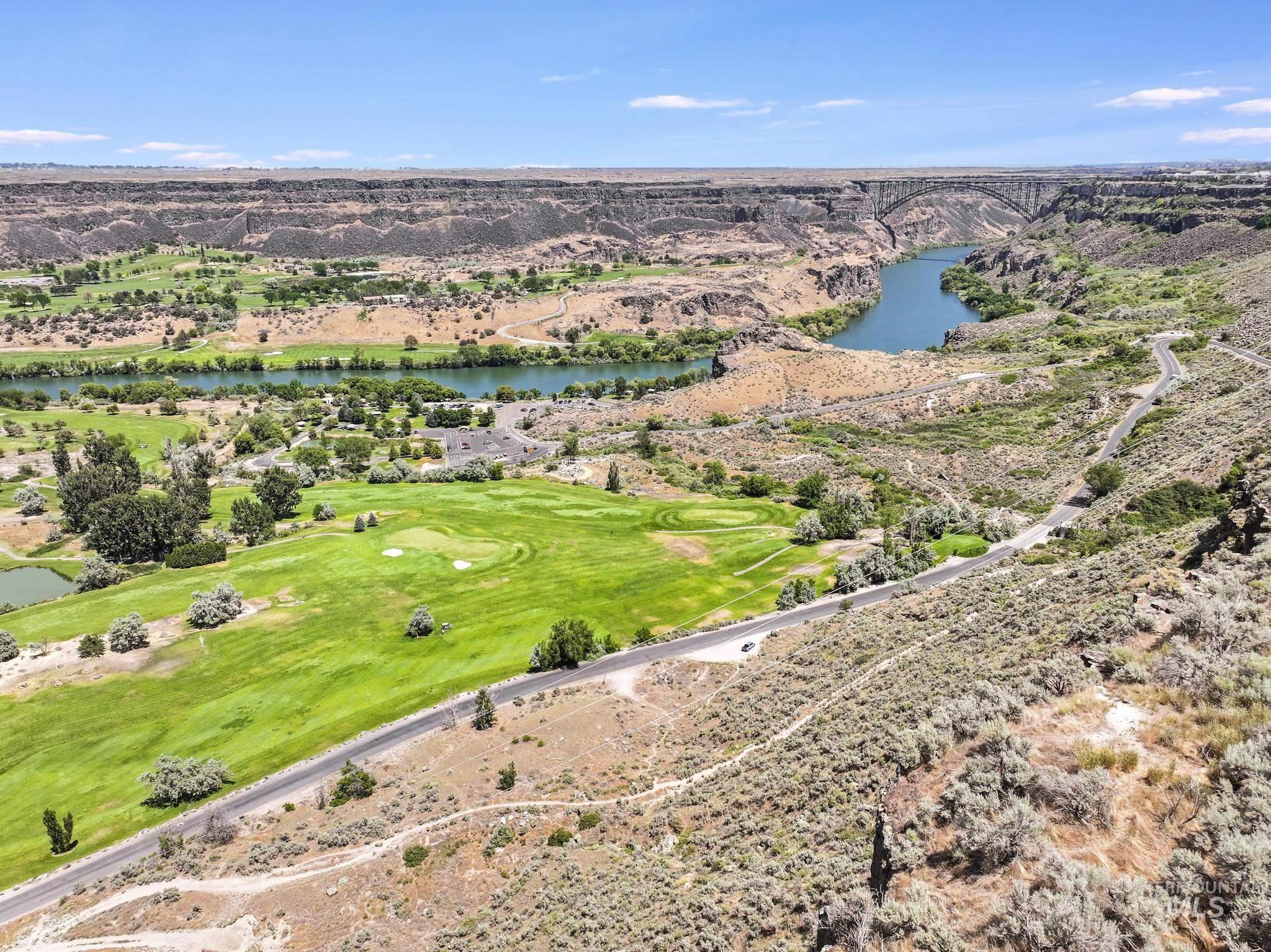 Aerial view of a large body of water and a golf club