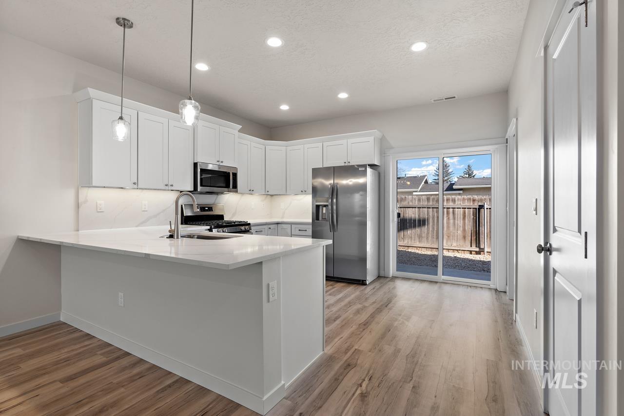 2455 Kindful, Boise, Idaho 83705, 3 Bedrooms, 2.5 Bathrooms, Residential Income For Sale, Price $849,000, 98924331