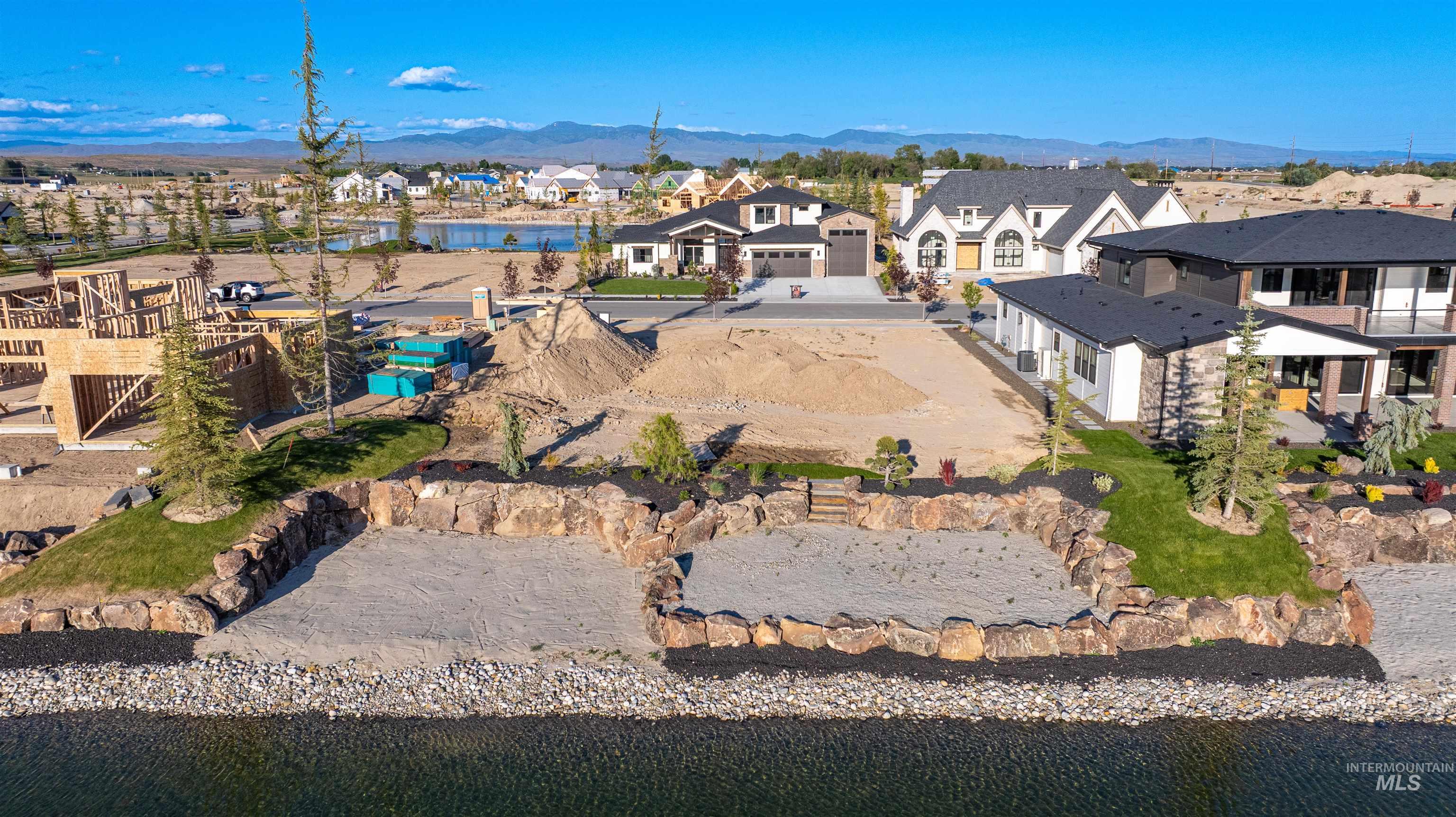 Aerial view of residential area featuring mountains