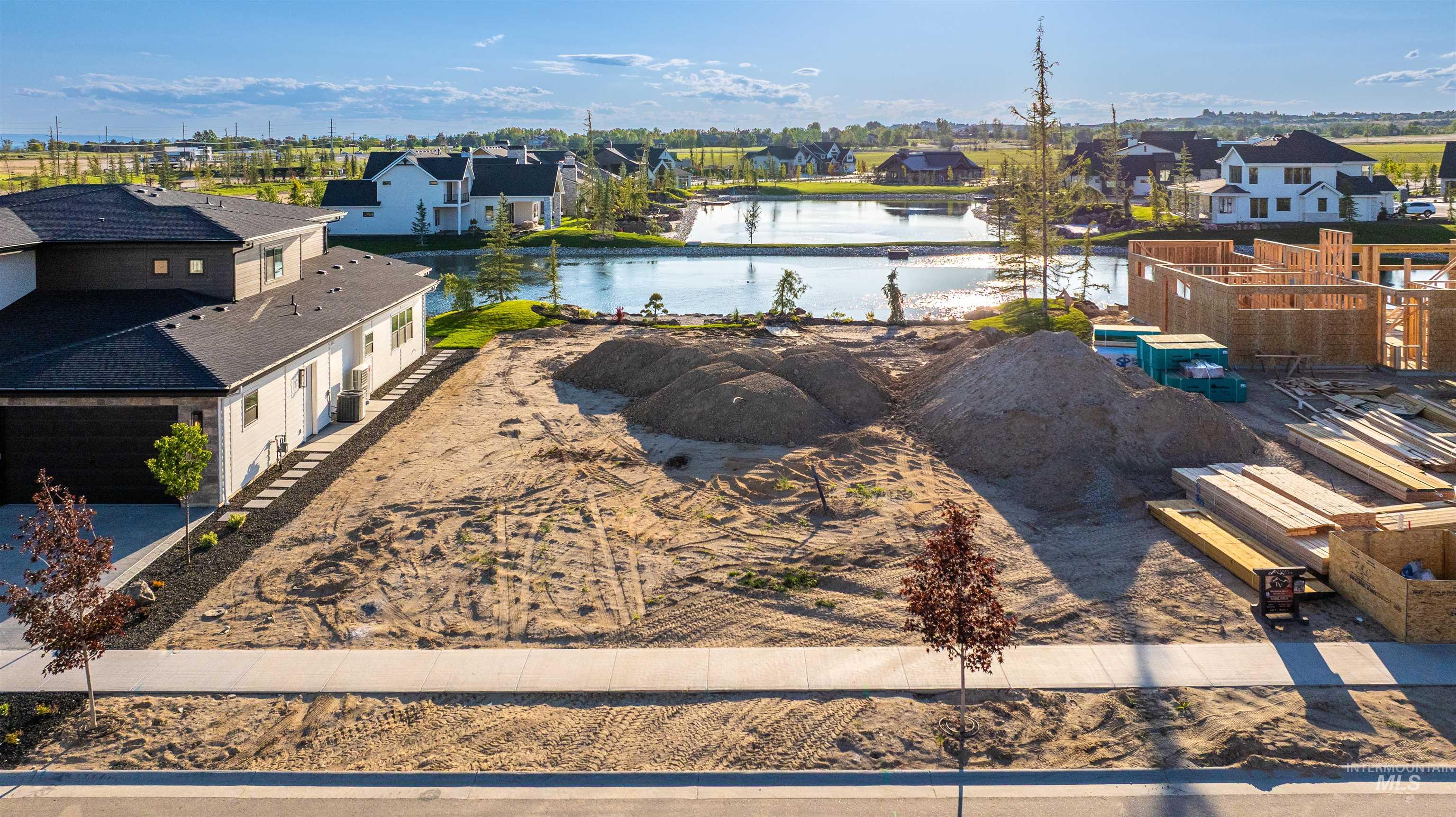 Aerial view of residential area with a nearby body of water