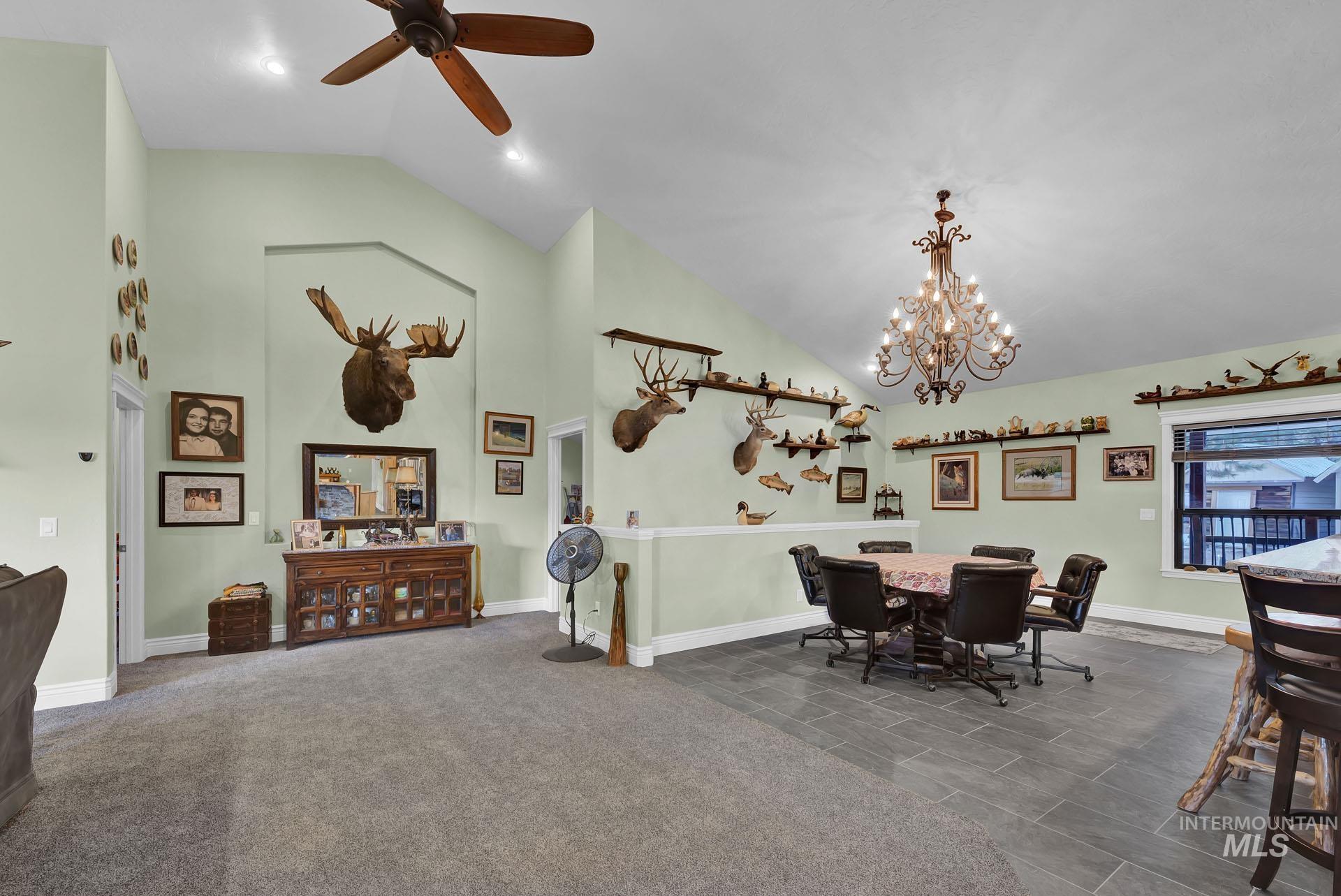 Open great room concept with informal dining area located adjacent to breakfast bars and spacious kitchen